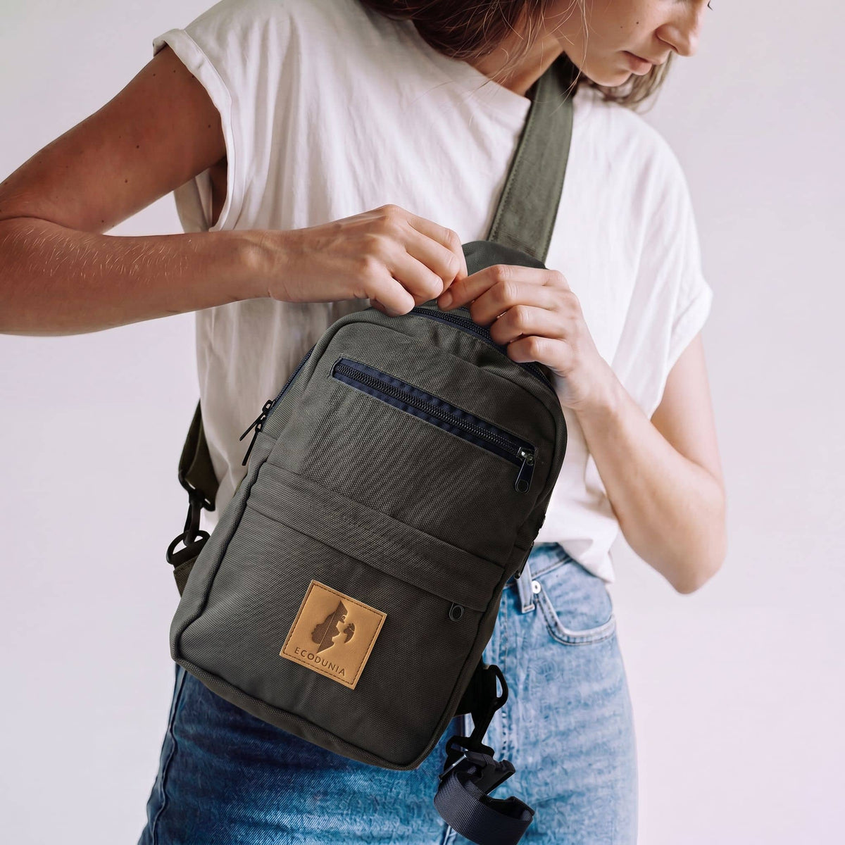 Umoja green canvas crossbody sling bag #color_green