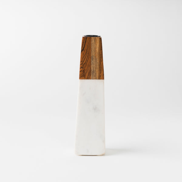 close-up of marble and wood contrast on candleholder

