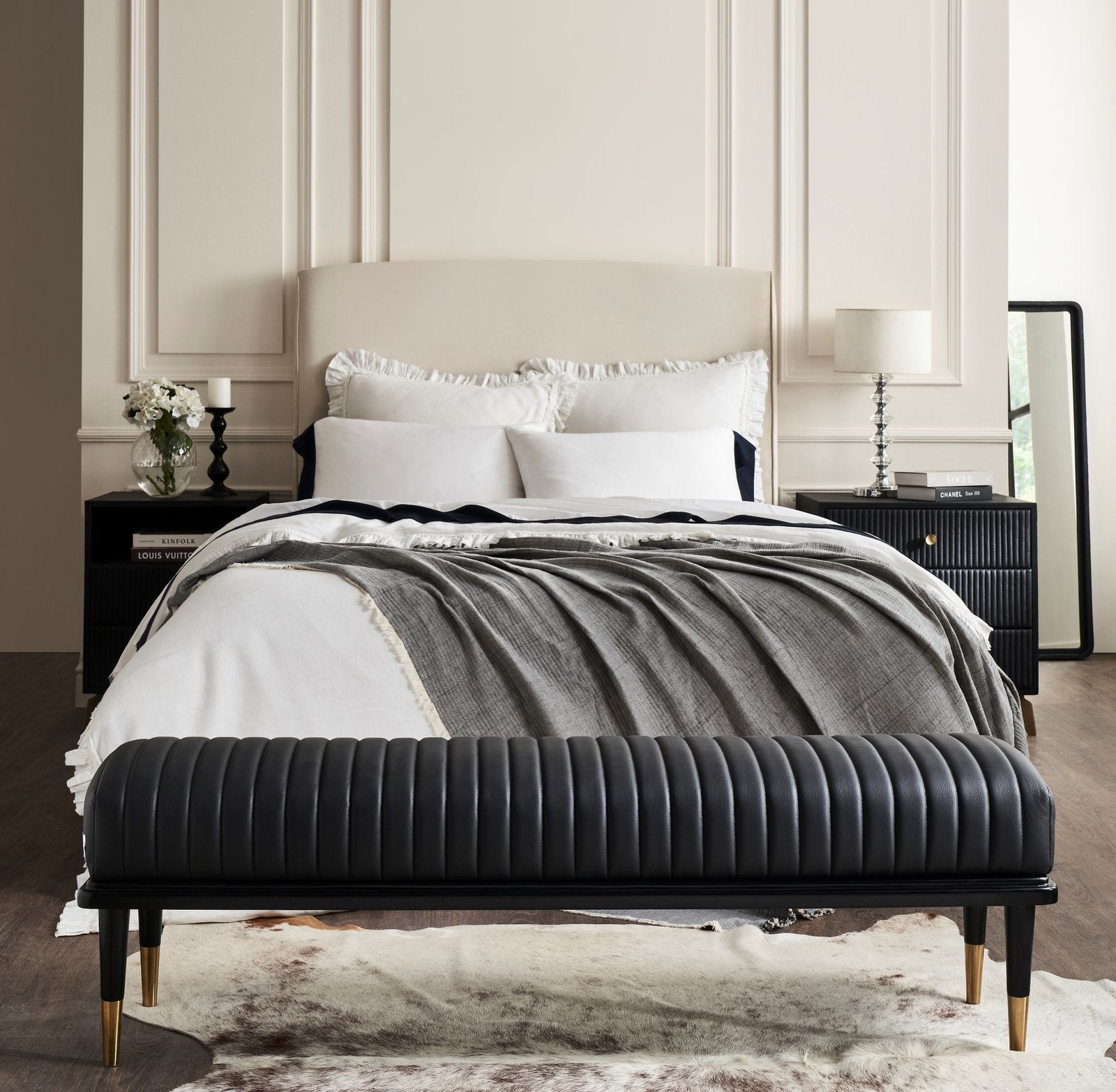 FN-5202-X-3_1|Elegant black upholstered bedroom bench with ribbed texture and gold accents, adding sophisticated seating to any space.