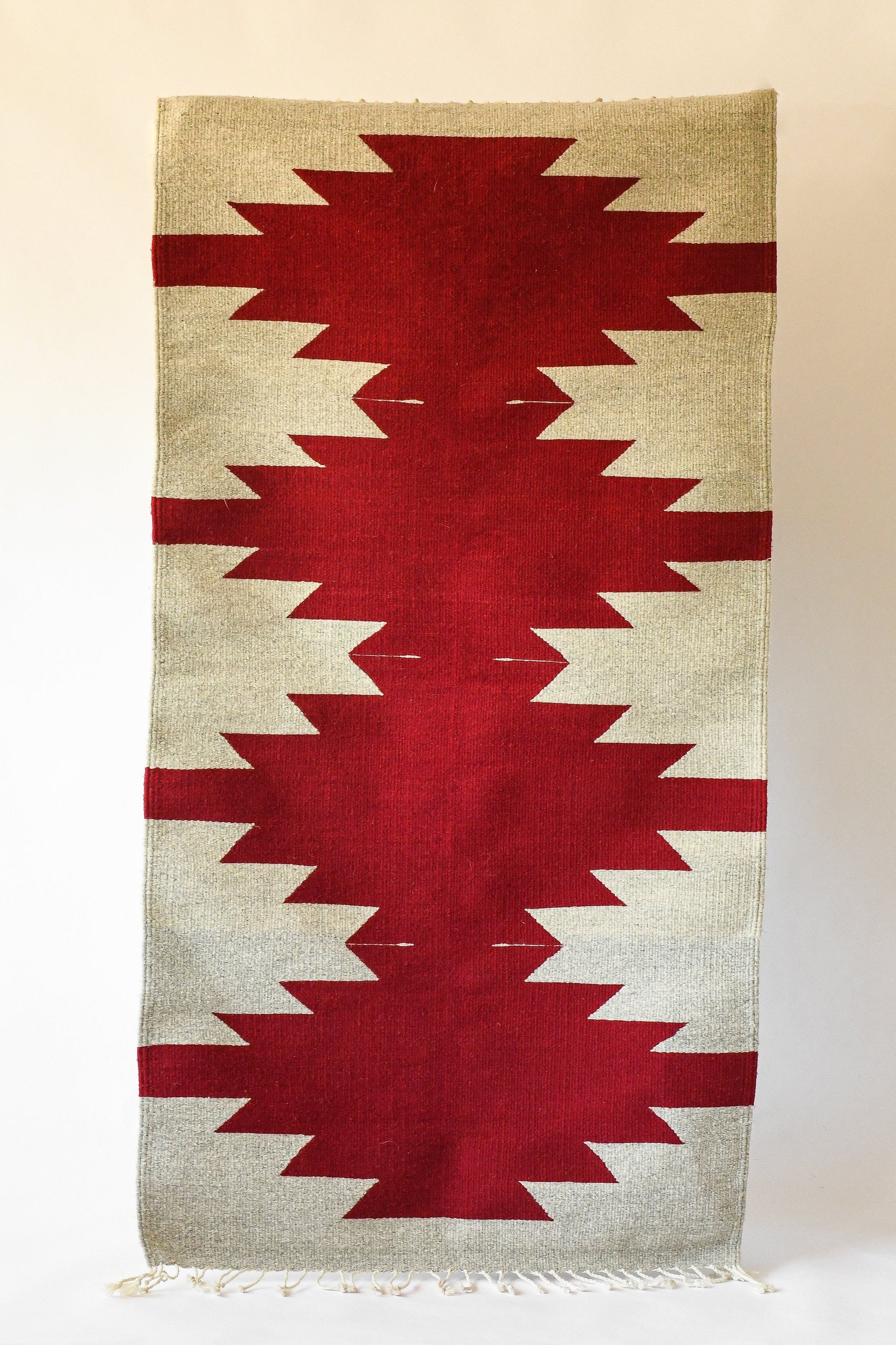 LOOM Imports handwoven ethical flat weave wool rugs. B Corp certified, women owned, fair trade, natural sustainable materials. 