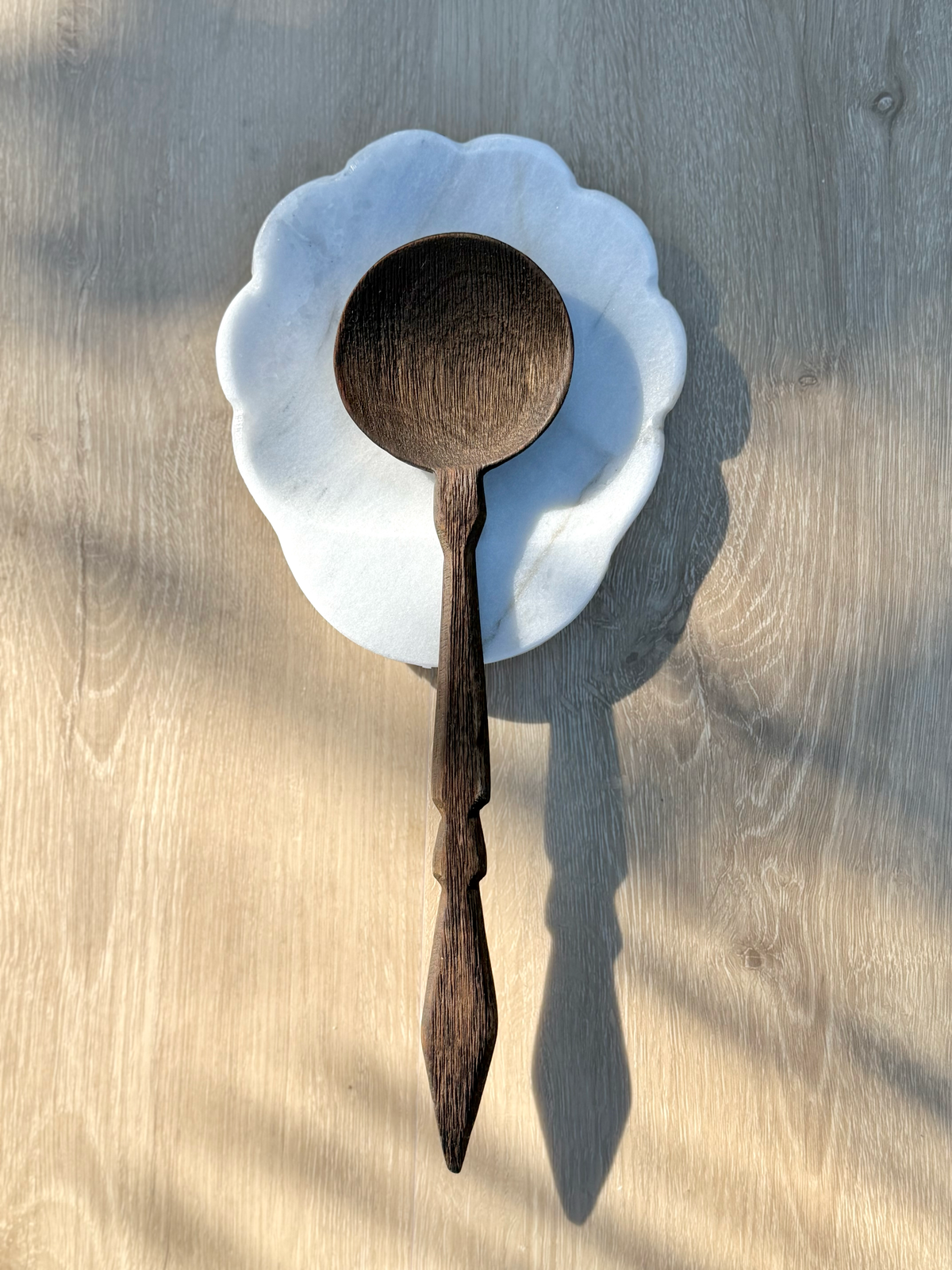 Belle white marble spoon rest handcrafted in Mexico with natural stone texture and scalloped edge detail