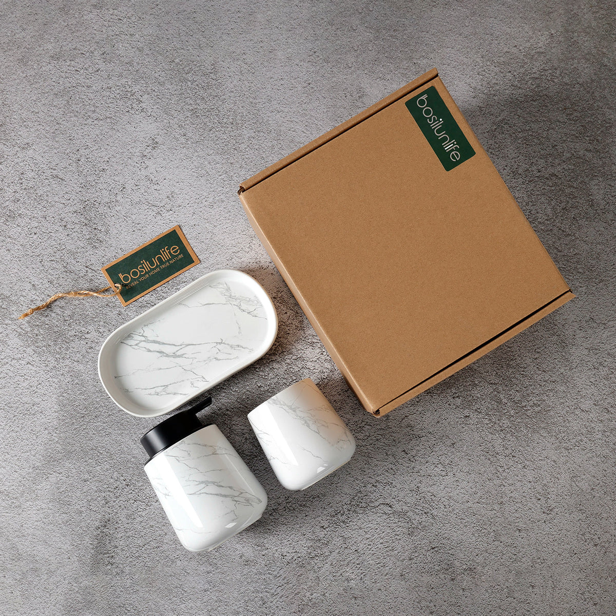BosilunLife Marble 3-piece recycled eco-clay bathroom set displayed next to its gift-ready brown cardboard packaging box on a grey surface.