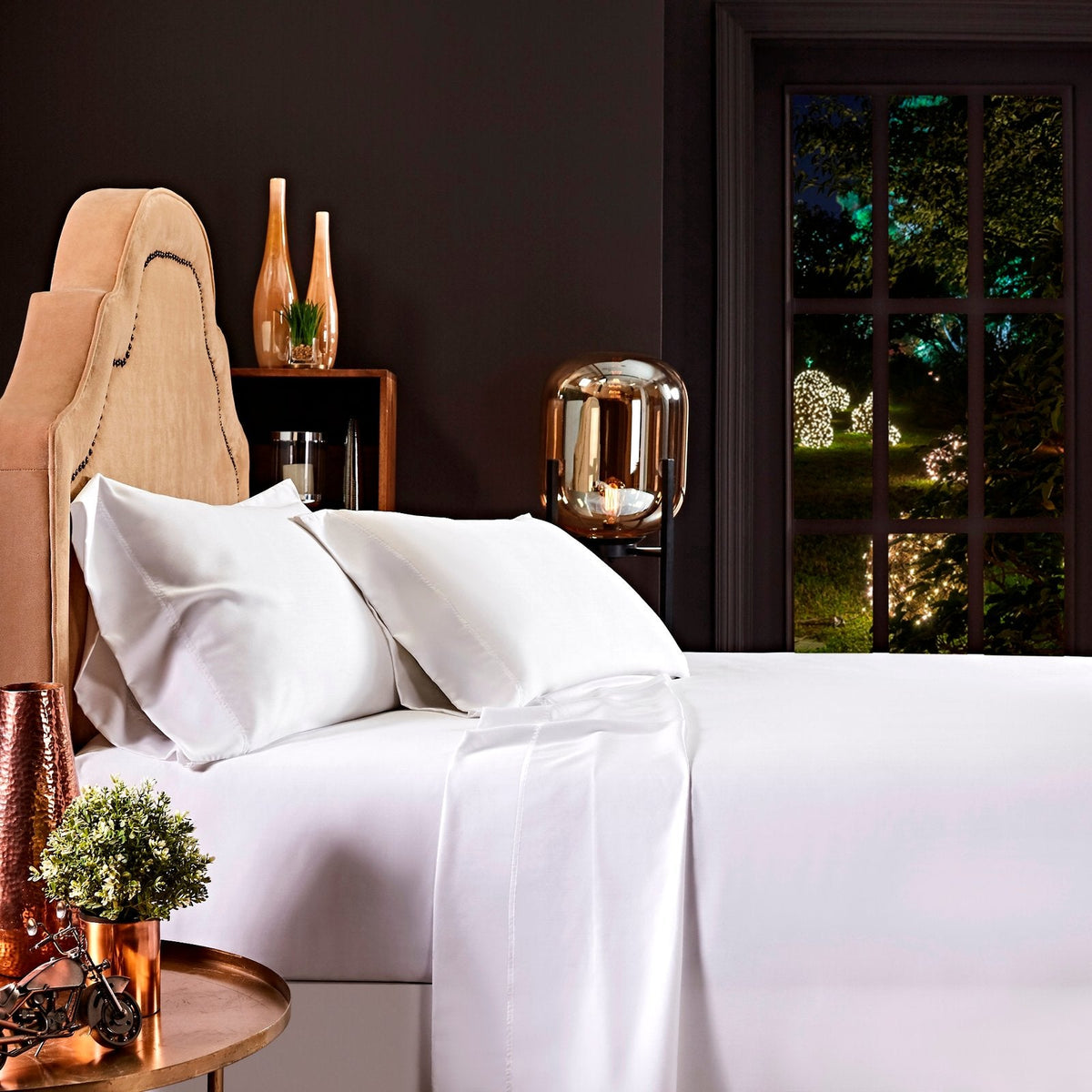 SSS-509-3880_1|Luxurious white 100% Lyocell sheet set on a bed, providing ultimate softness and breathability for restful sleep. (116 chars)