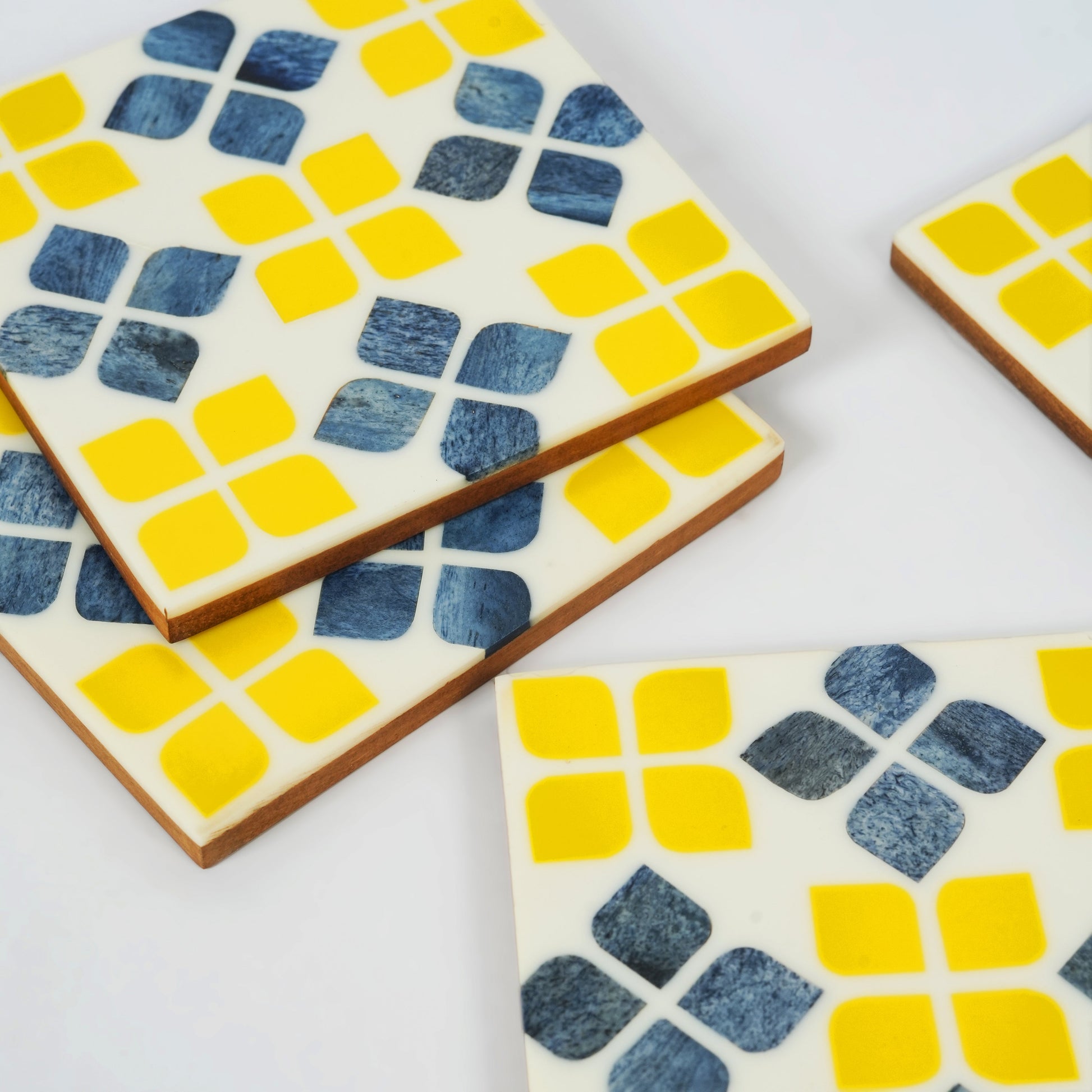 close-up handcrafted bone inlay marigold mosaic pattern coaster