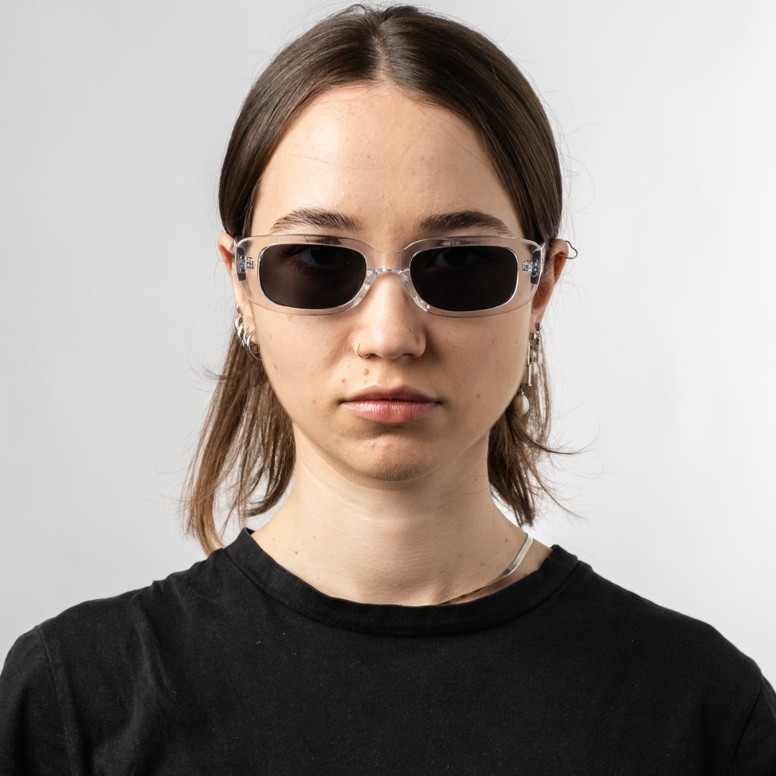 Female wearing Sad Eyewear Bouquet rectangle sunglasses clear frames with uv protection lenses