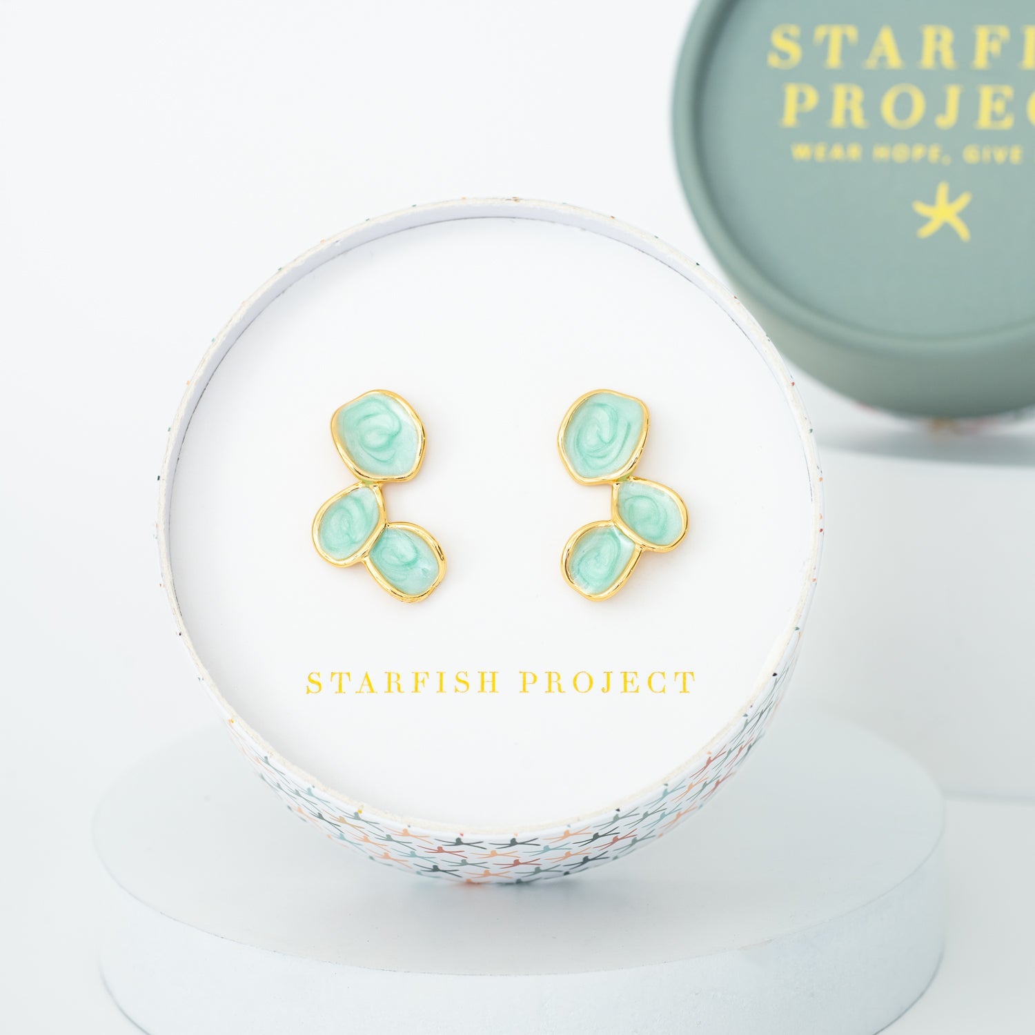 Mint green and gold earrings in gift box, Starfish Project, quality jewelry brands, green studs, gold rimmed studs, 14k gold earrings