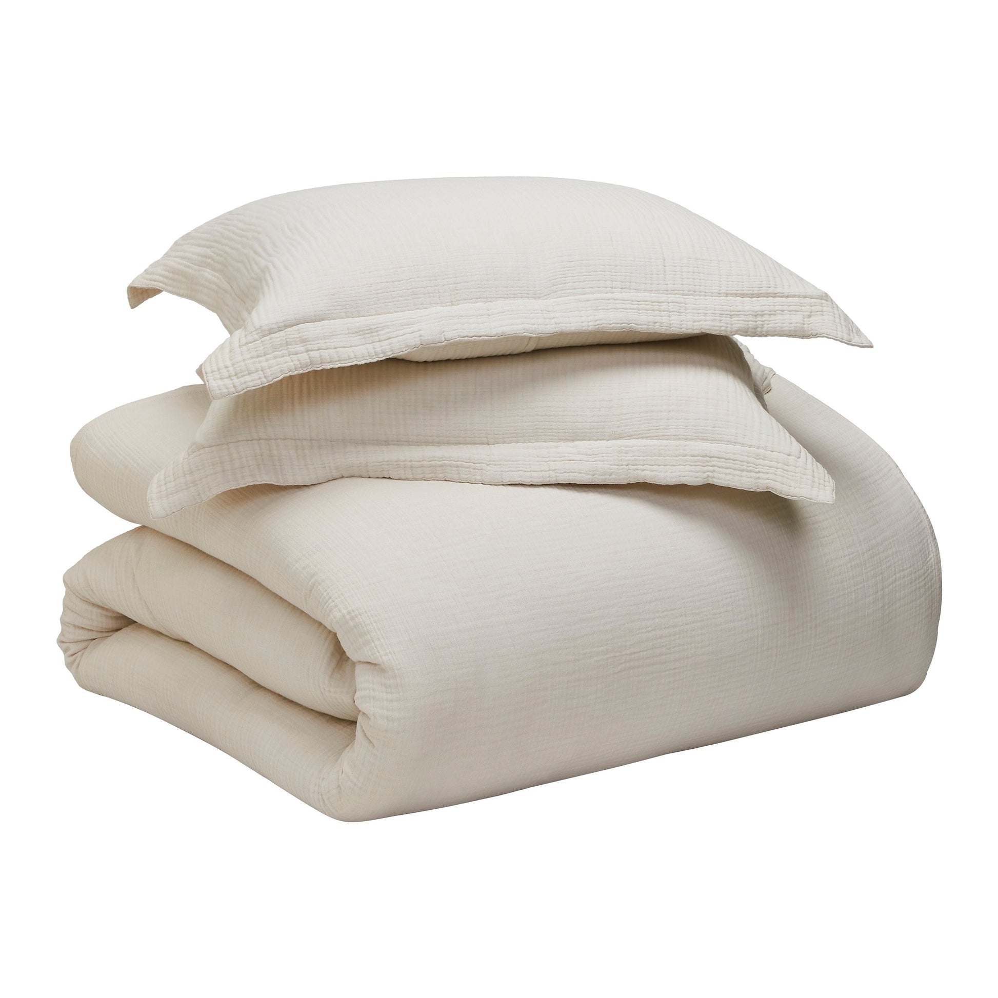 DT-049-9092_9|Complete cream textured duvet cover set with matching pillow shams, neatly folded for elegant bedroom styling.