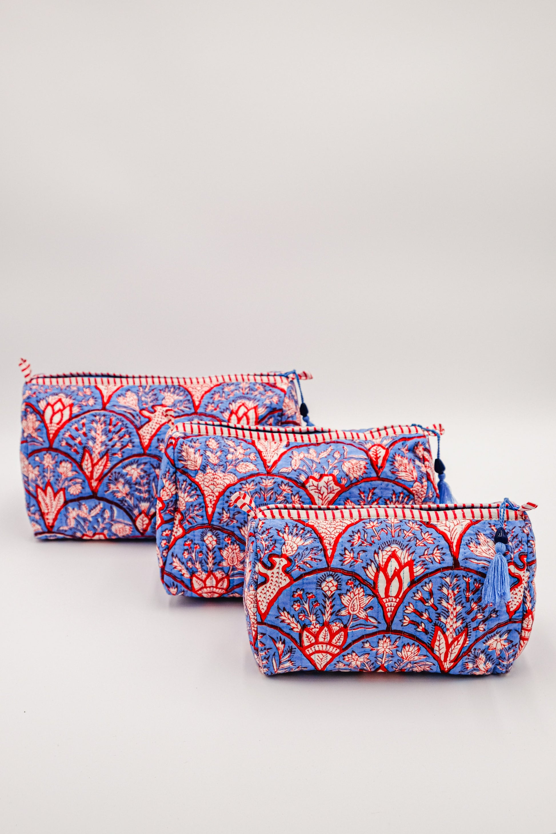 Set of three Blue Arch toiletry bags
