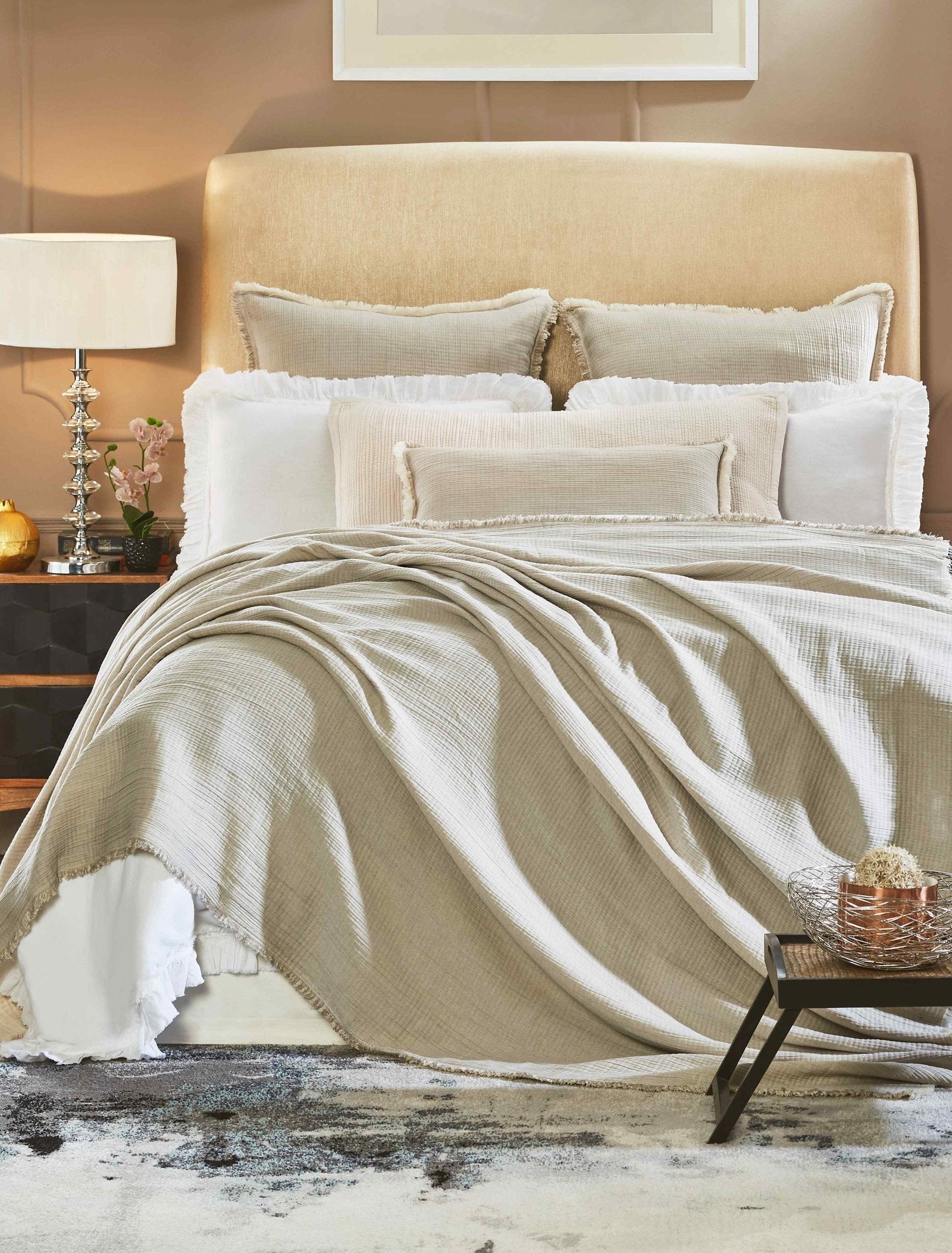 BT-102-9496_1|Elegant light grey textured blanket draped gracefully over a bed, creating a serene and sophisticated bedroom ambiance.