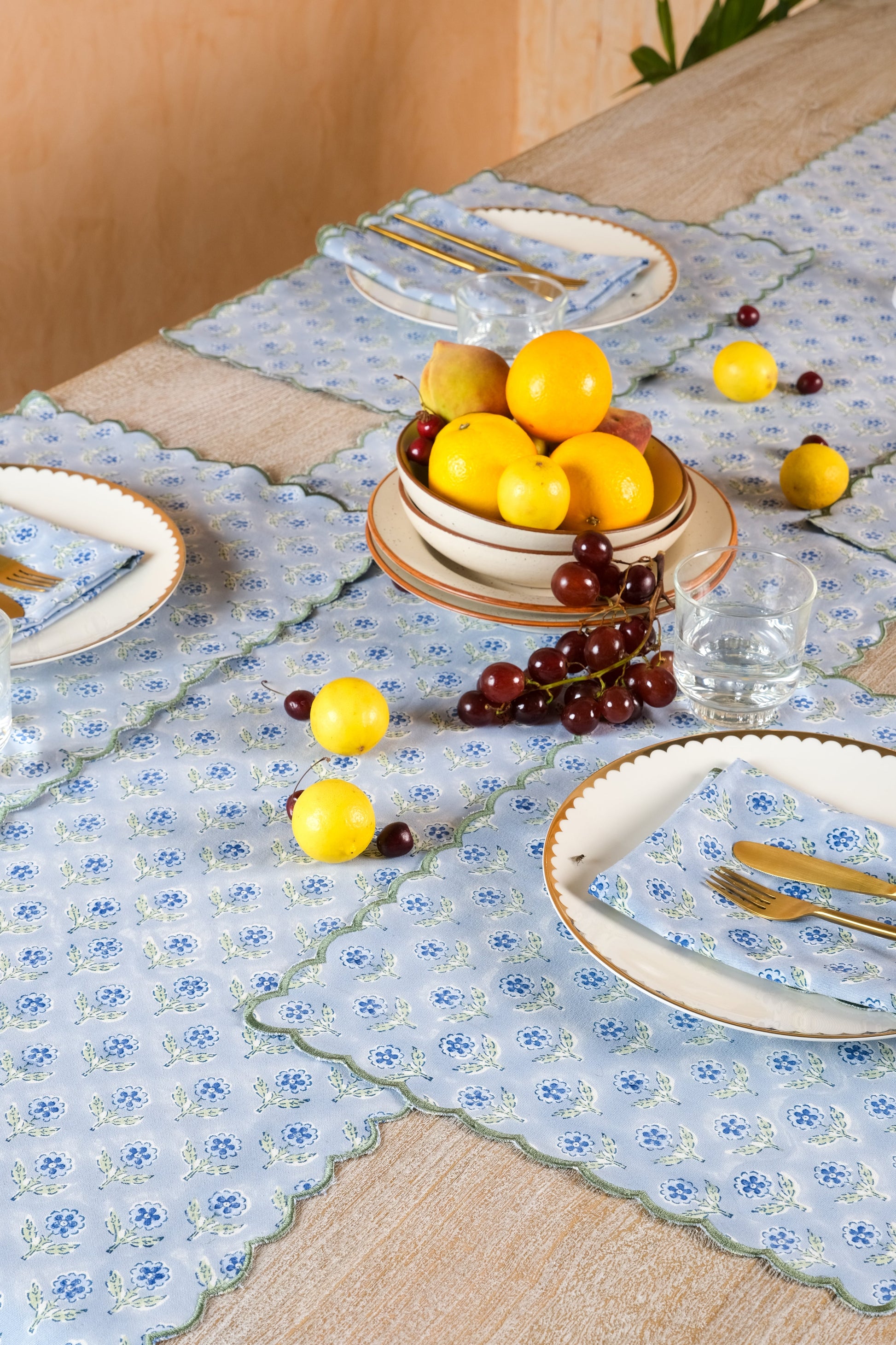 Inner Child blue scallop-edged embroidered blockprint tablerunner with table setting