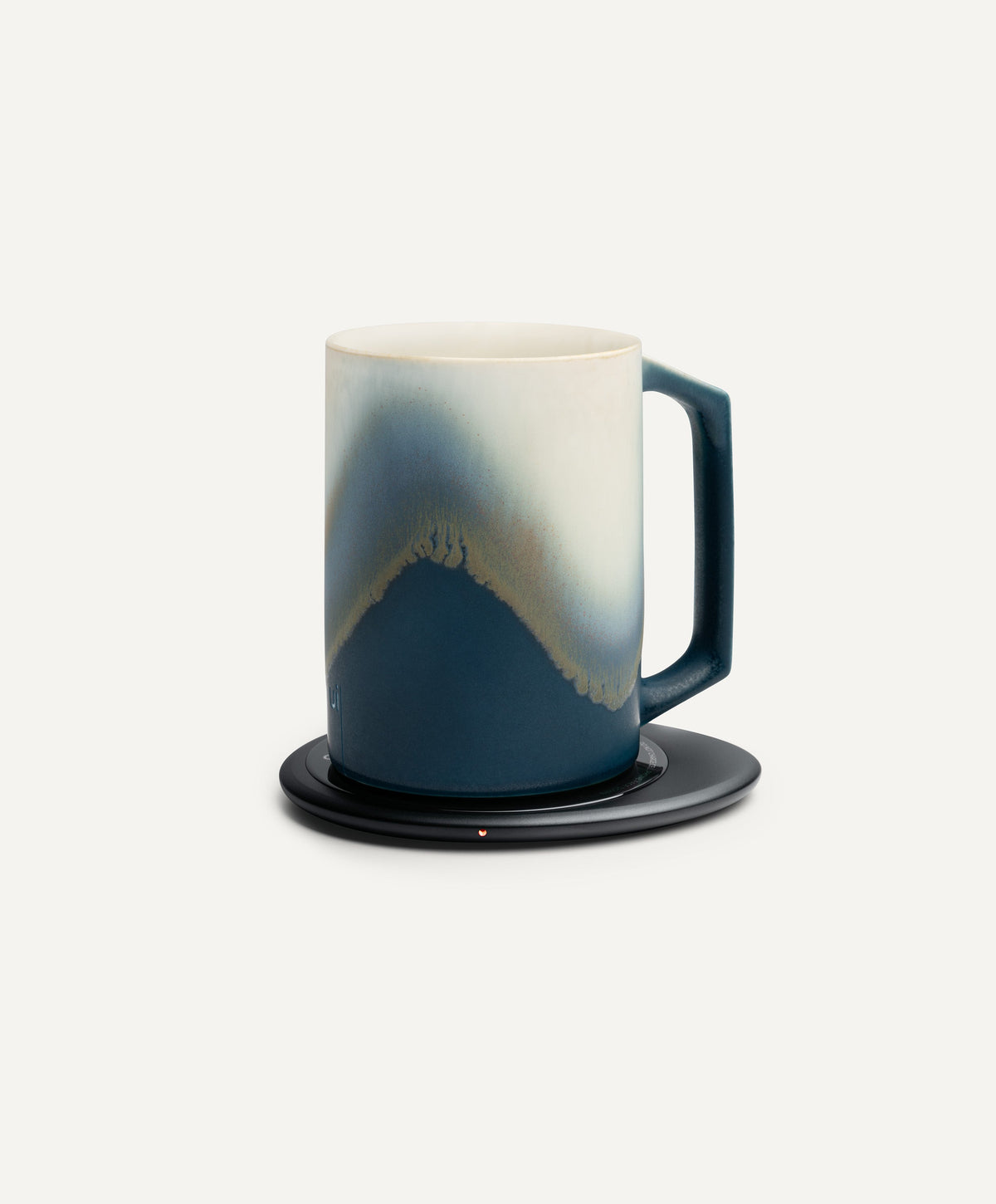 Ui Artist Collection Self-Heating Ceramic Mug 12 fl oz / 355 mL in Arctic Radiance on Ohom Charging Pad 3