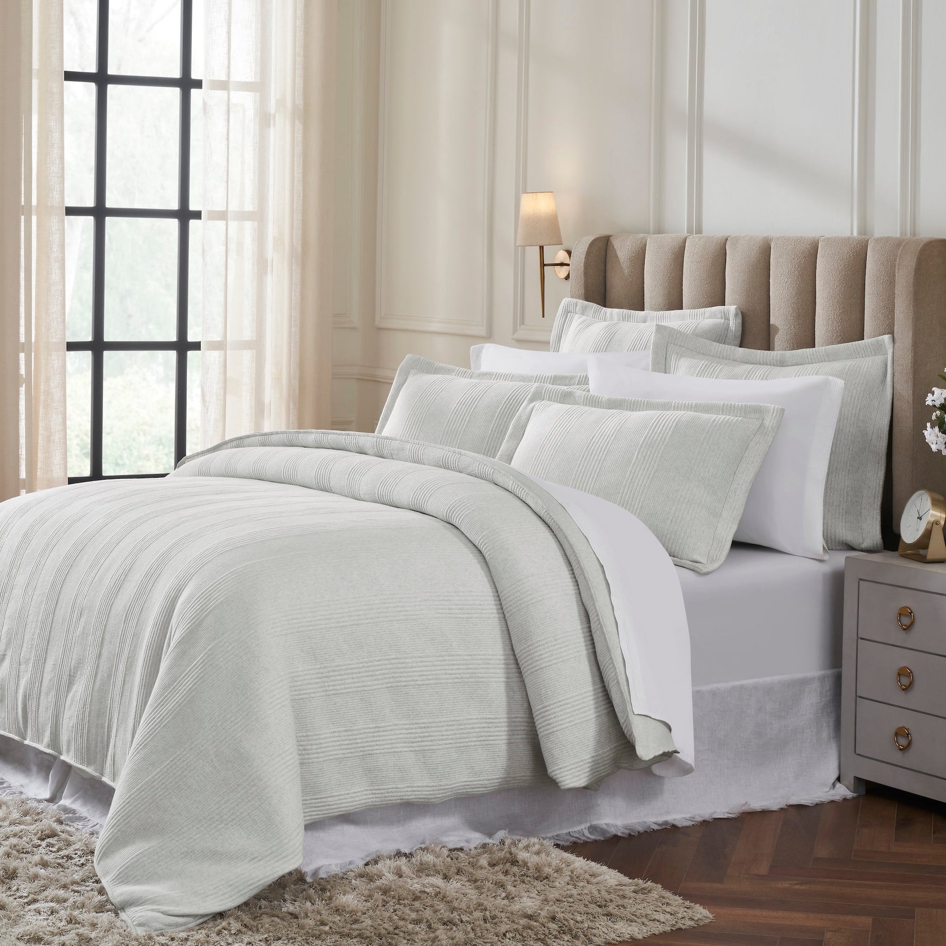 DT-043-10692_2|Elegant light grey ribbed duvet cover set on a bed, with matching shams and pillows for a luxurious bedroom aesthetic.