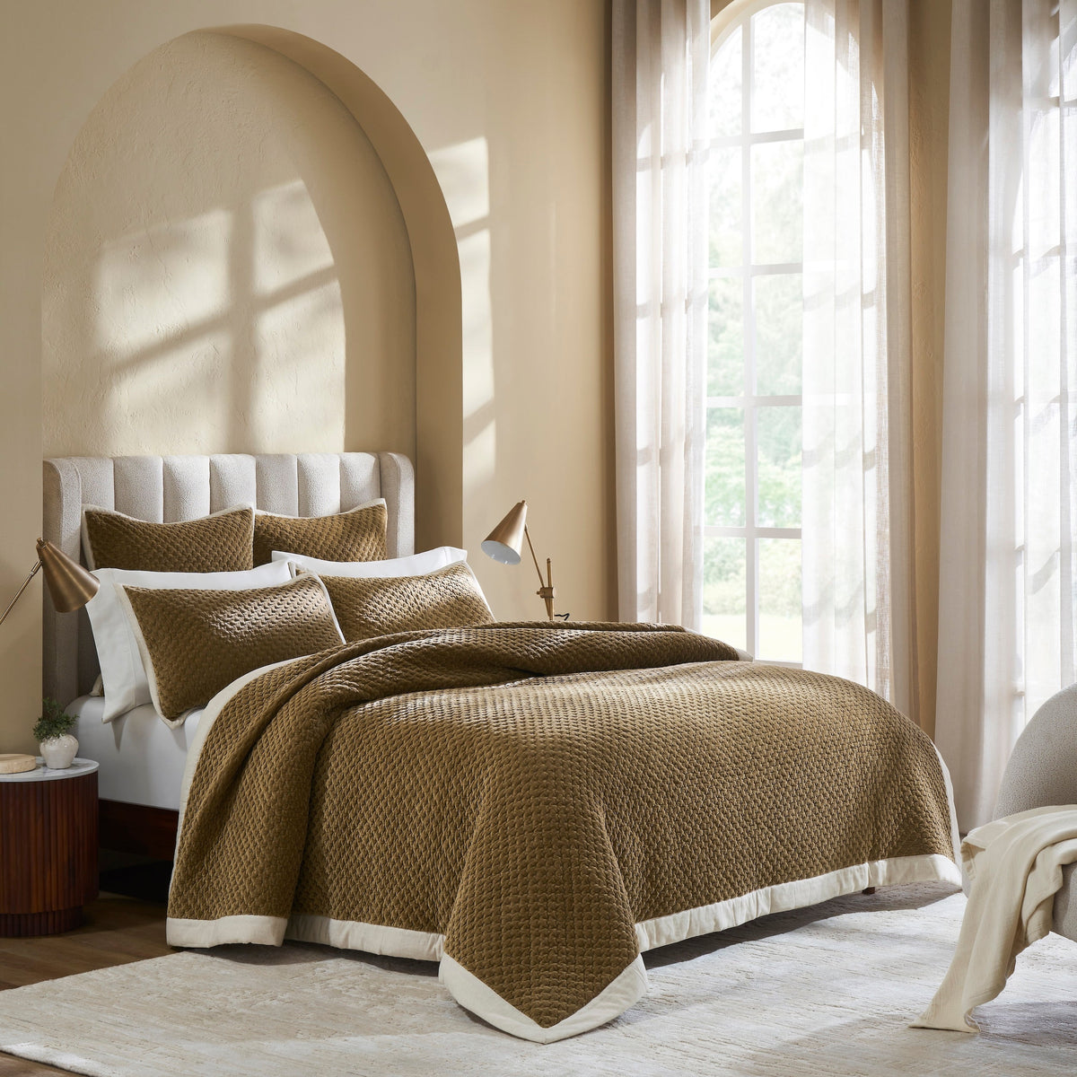 QT-378-9496_3|Luxurious gold textured quilt and matching shams on a king bed, creating a cozy and inviting bedroom retreat. Premium bedding.