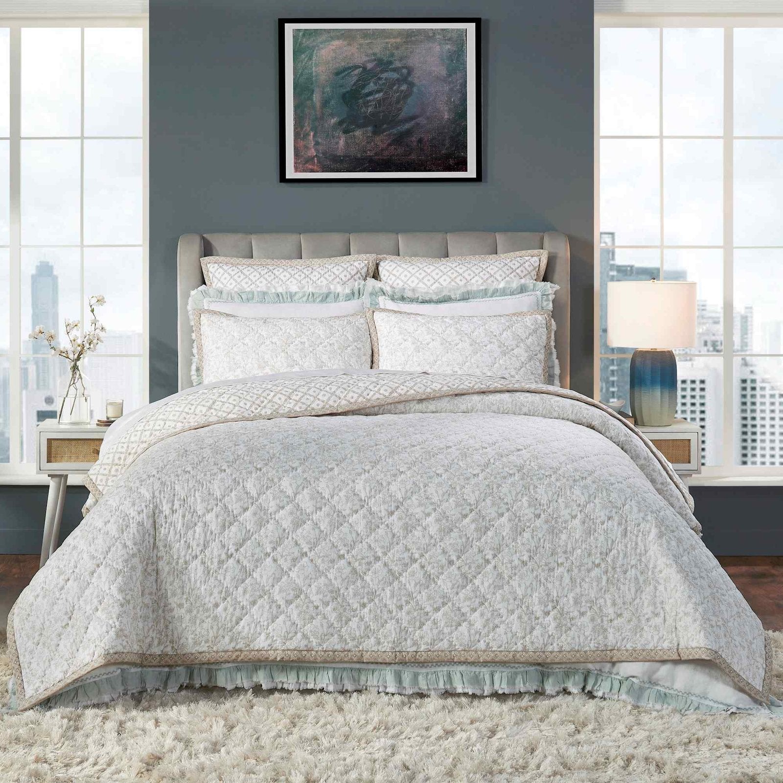 QT-345-X_1|Luxurious beige floral quilted comforter set with shams & decorative pillows, creating an inviting modern bedroom.