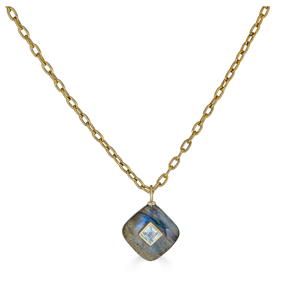 Labradorite pendant necklace with square white topaz inlay on a gold-plated chain.