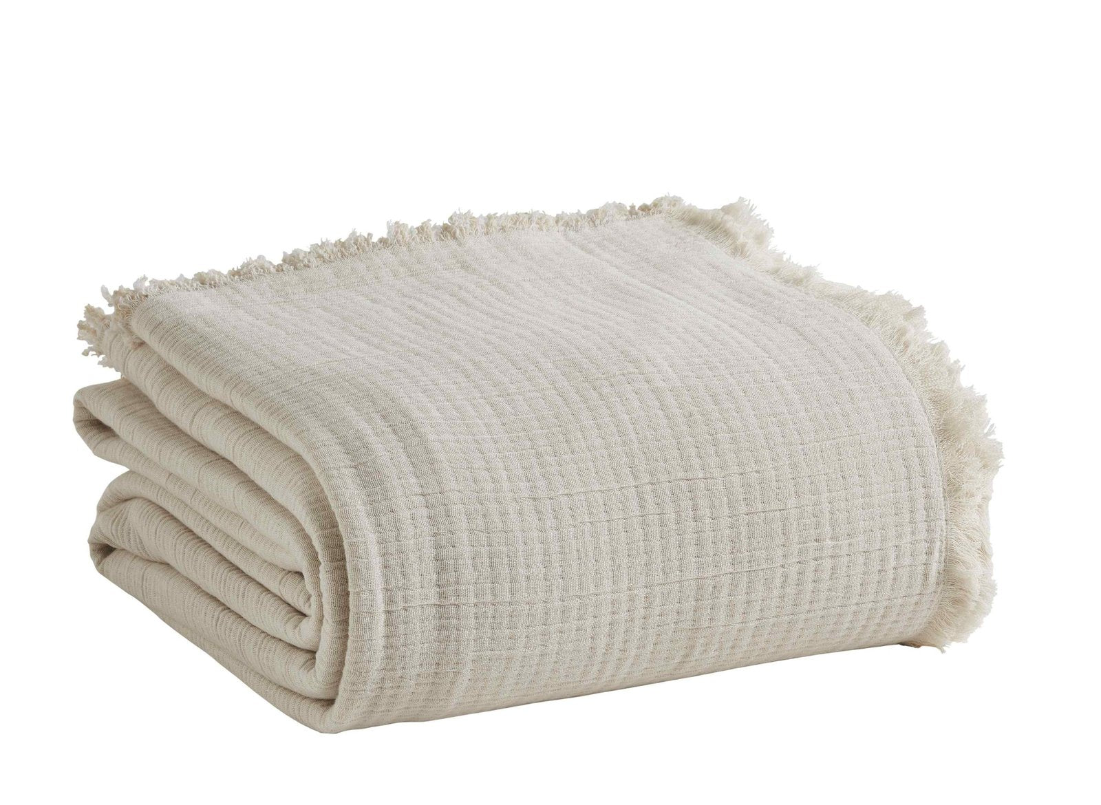 BT-103-11096_3|Folded off-white textured blanket with a delicate fringe edge, perfect for adding cozy comfort and a light touch to home decor.