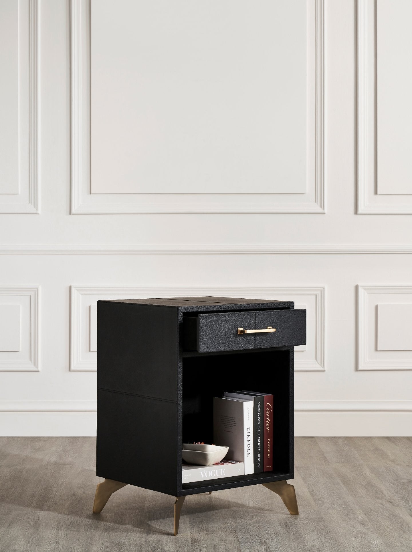 FN-5200-201828_3|Open drawer of black leather furniture nightstand with gold handle, showing internal storage and luxurious detail.