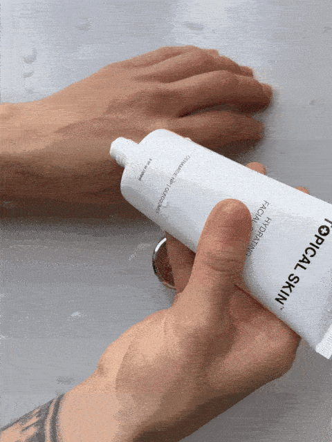 GIF of a  hand squeezing out cleanser on the other hand