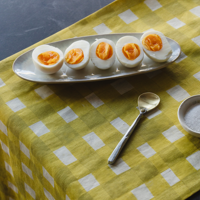 Yellow Cross-Hatch linen table runner styled on spring dining table - Goldie Home