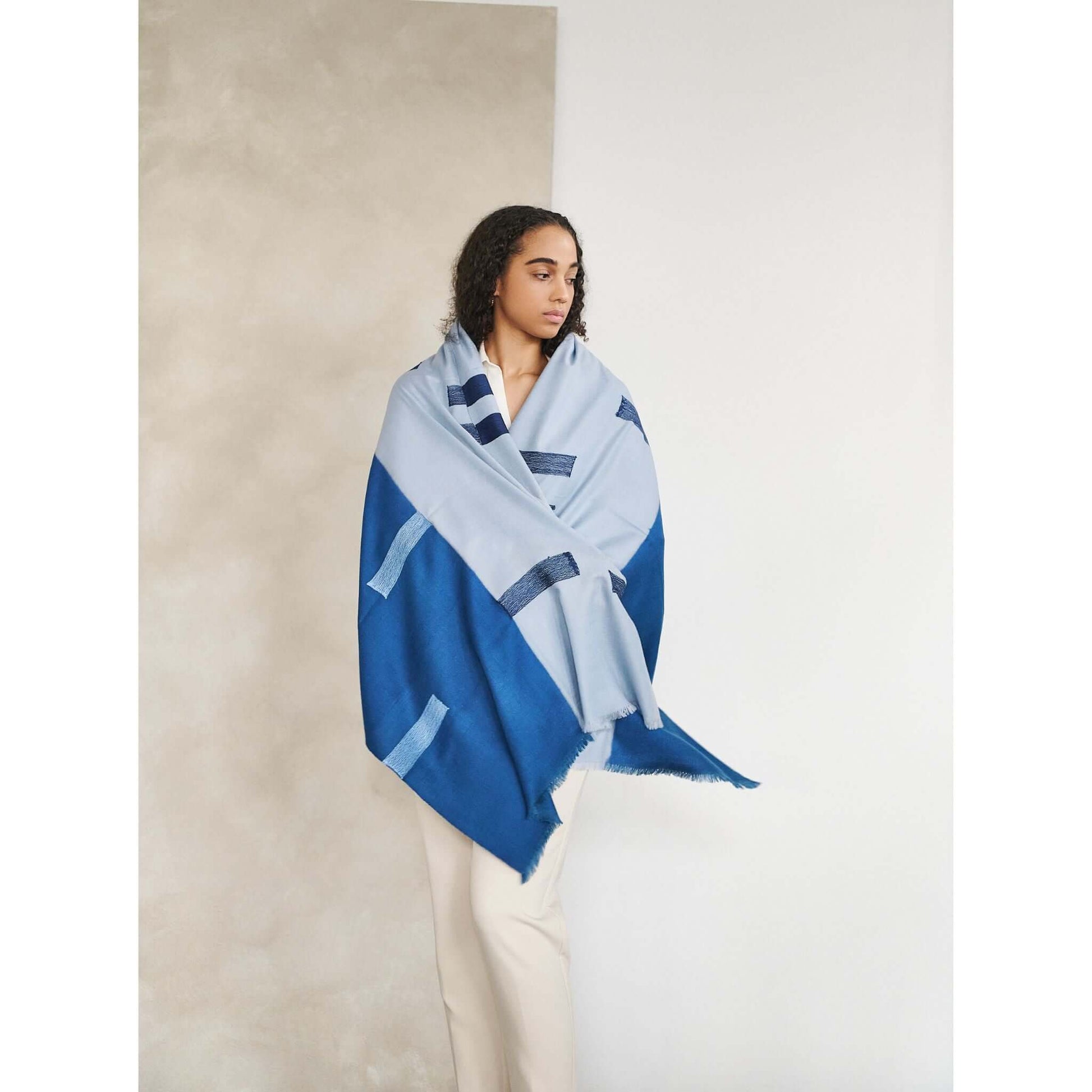 Harbor Blue Silk Merino Hand Woven Hand Embroidered Modern Artisanal Scarf styled elegantly by a model.