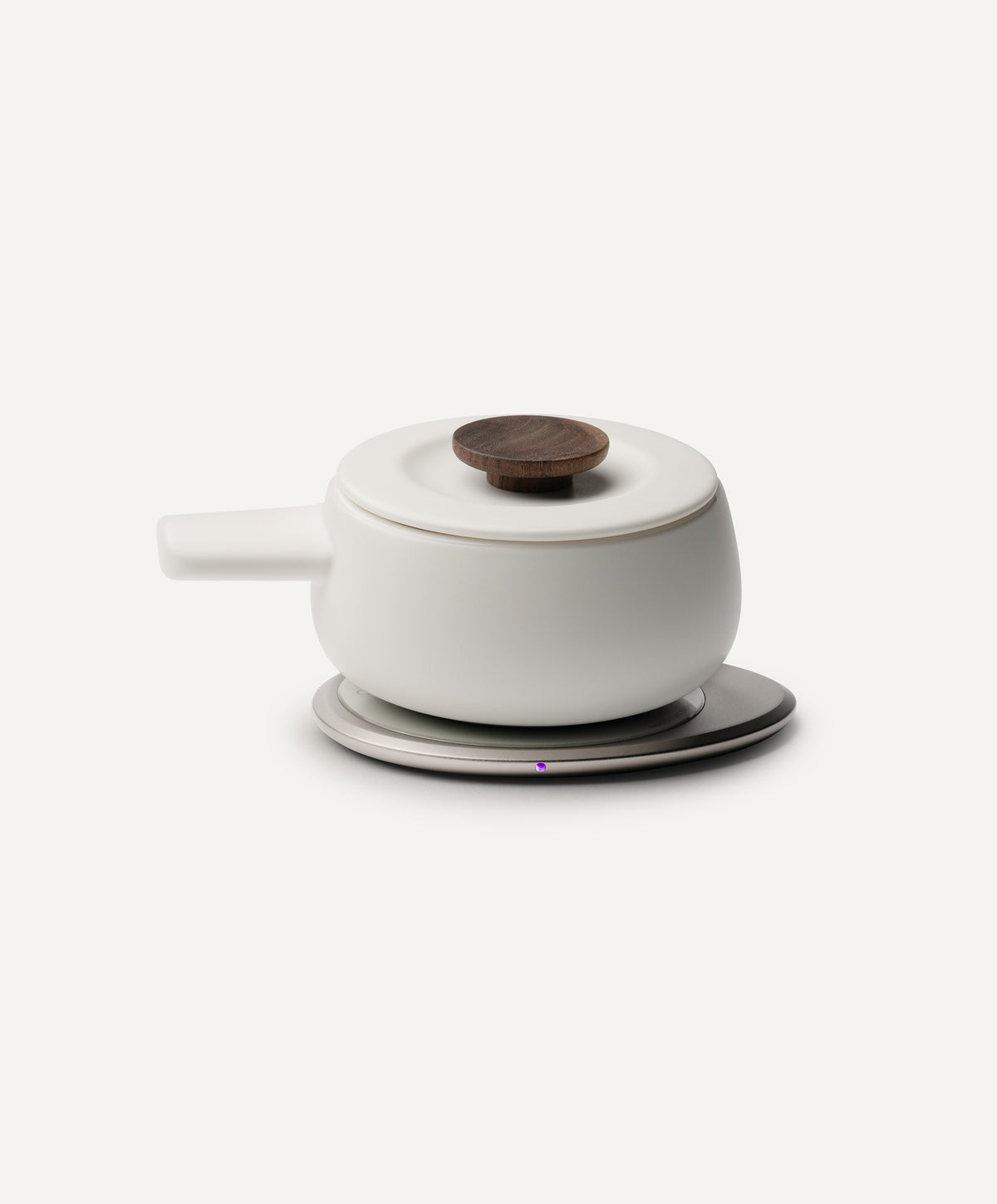 Fondi Self-Heating Ceramic Fondue 7.6 fl oz / 225 mL in Jasmine White on Ohom Charging Pad 3