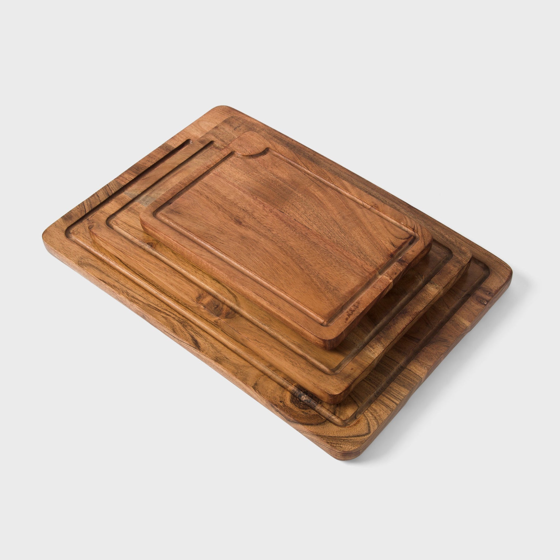 set of three natural acacia wood cutting boards by mela artisans
