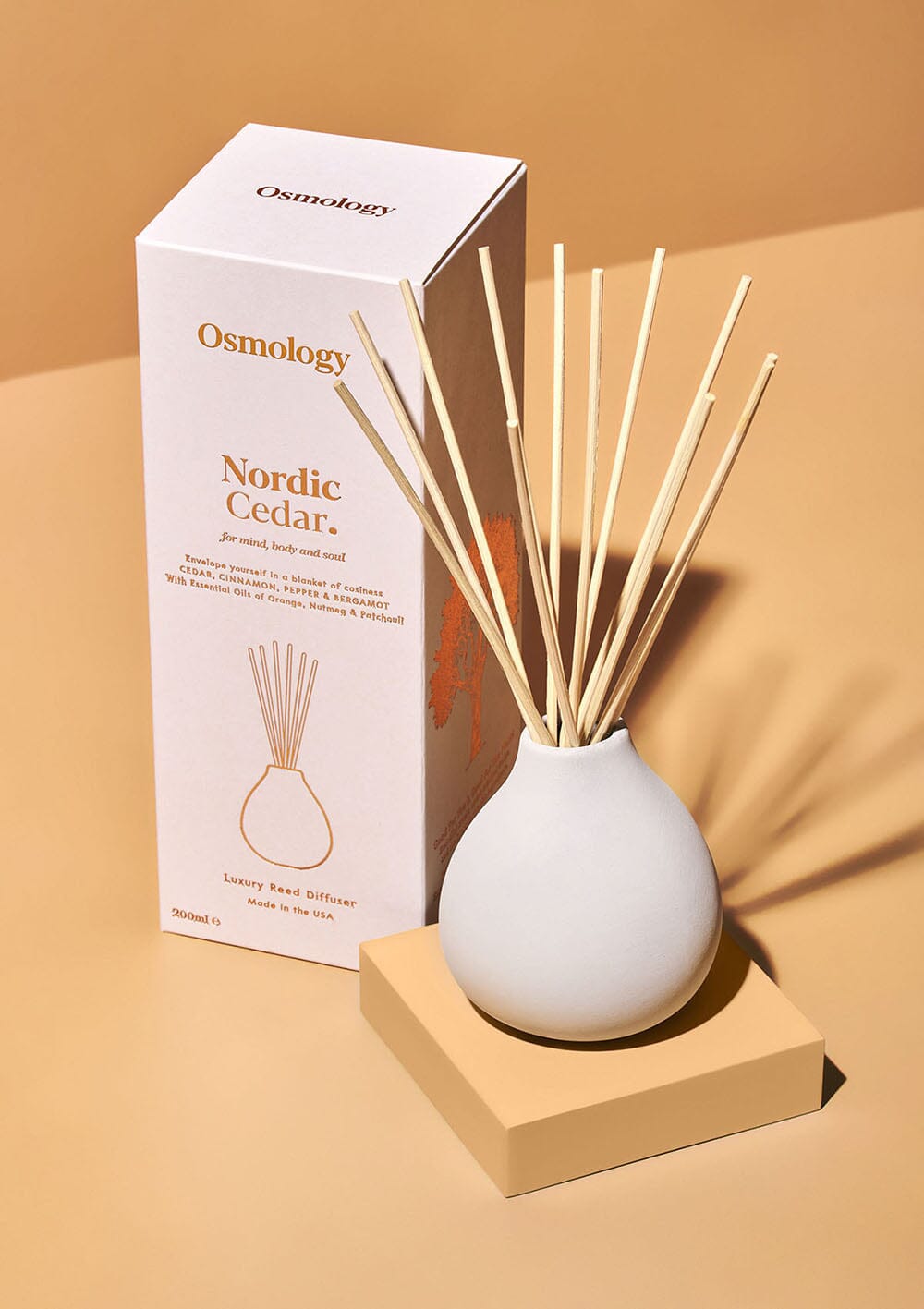 Osmology Nordic Cedar ceramic reed dh product packaging on white background