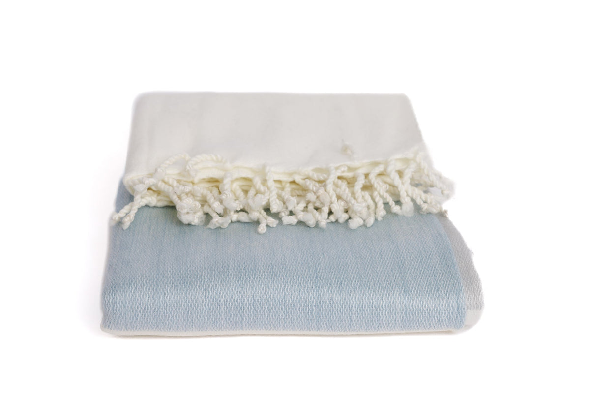 Blue and white artisanal woven throw