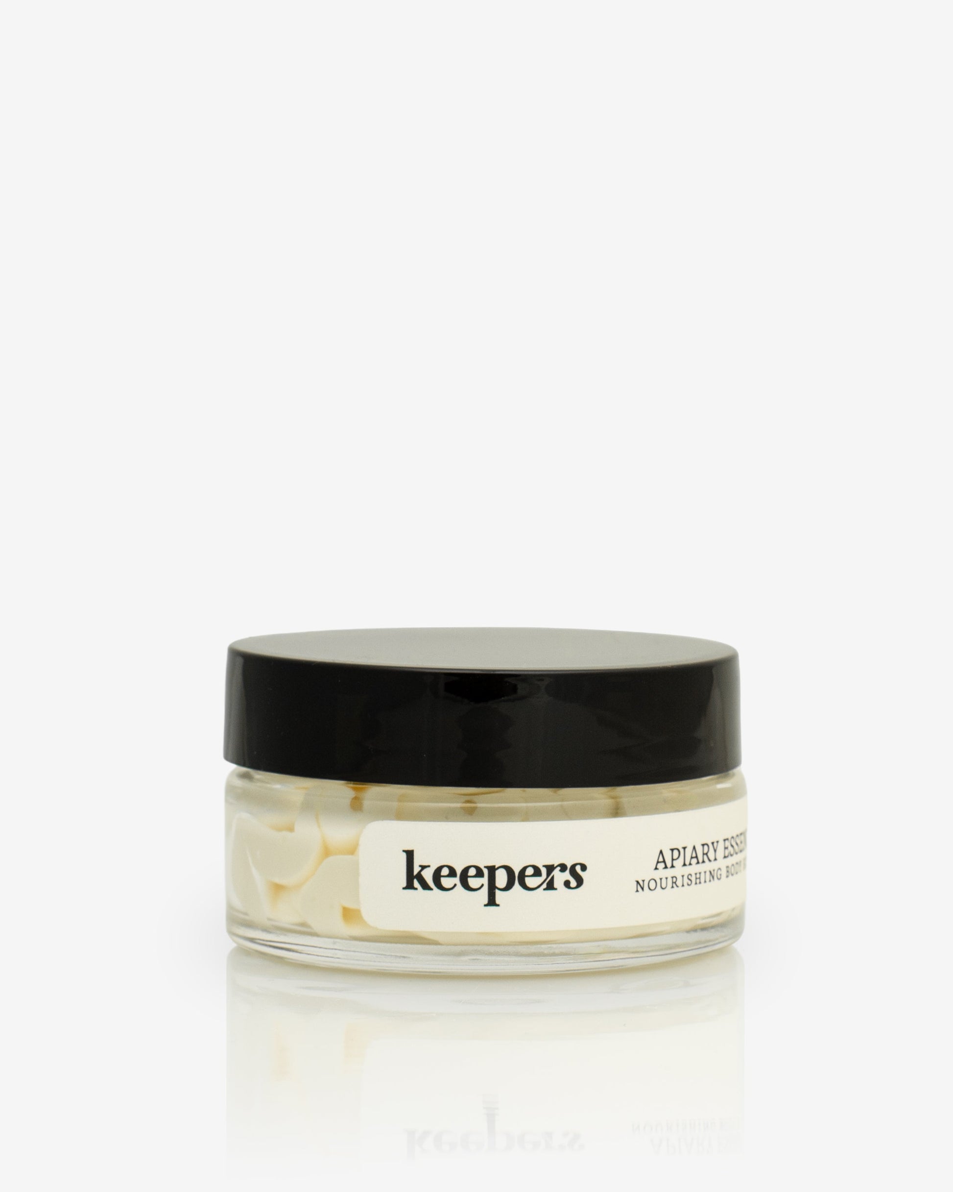 Apiary Essence body butter jar on a white background