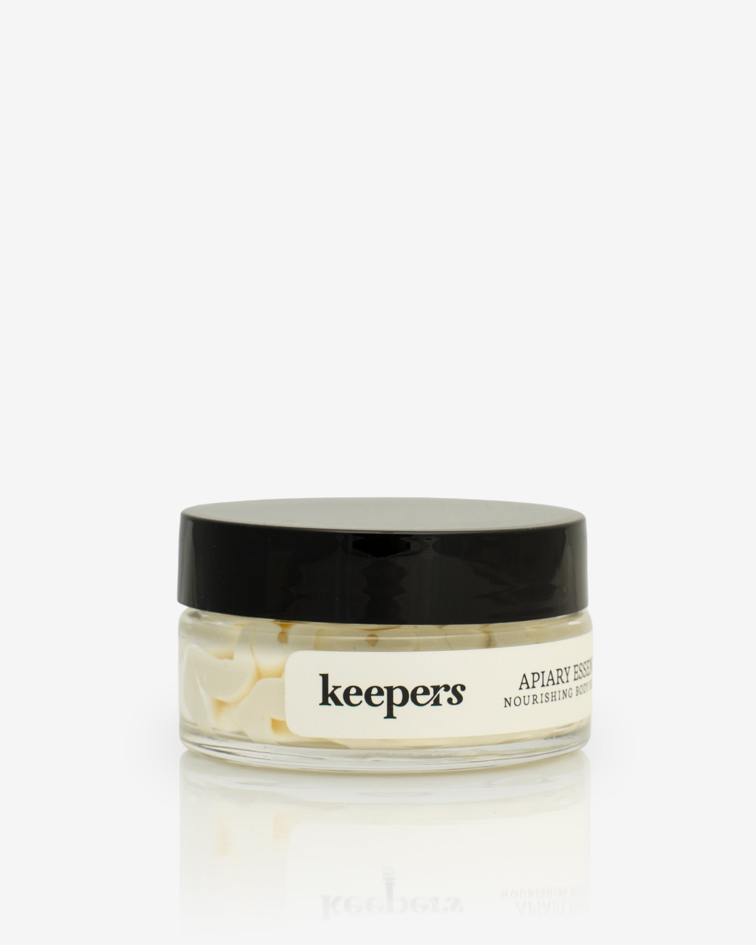Apiary Essence body butter jar on a white background