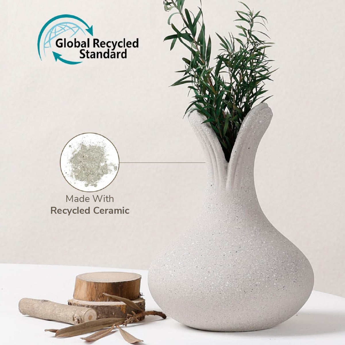 White ceramic vase with plant, wooden logs, and 'Global Recycled Standard' label on a light background