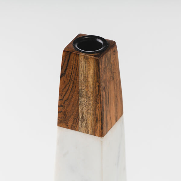close-up of marble and wood contrast on candleholder
