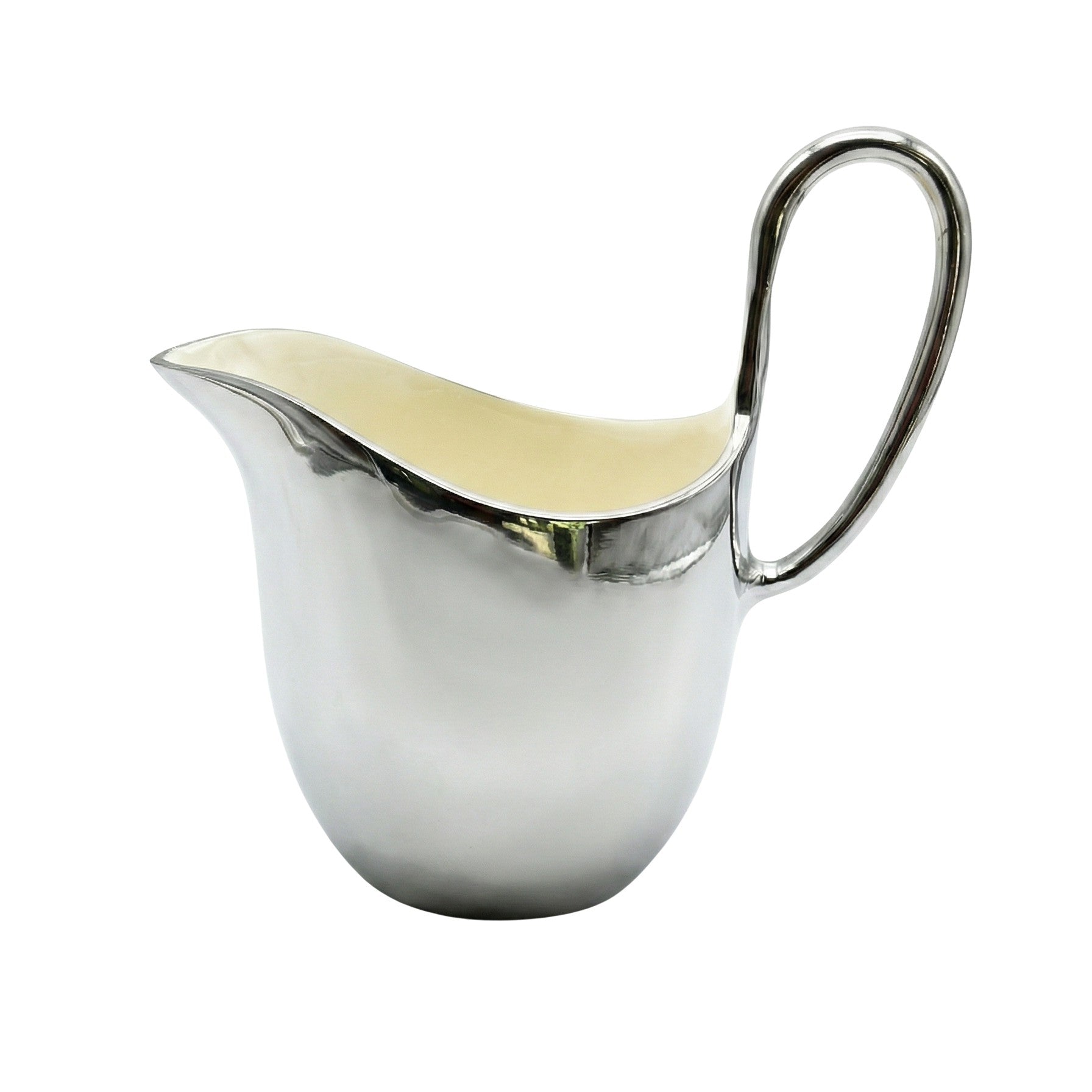 Silver creamer with a white interior on a white background