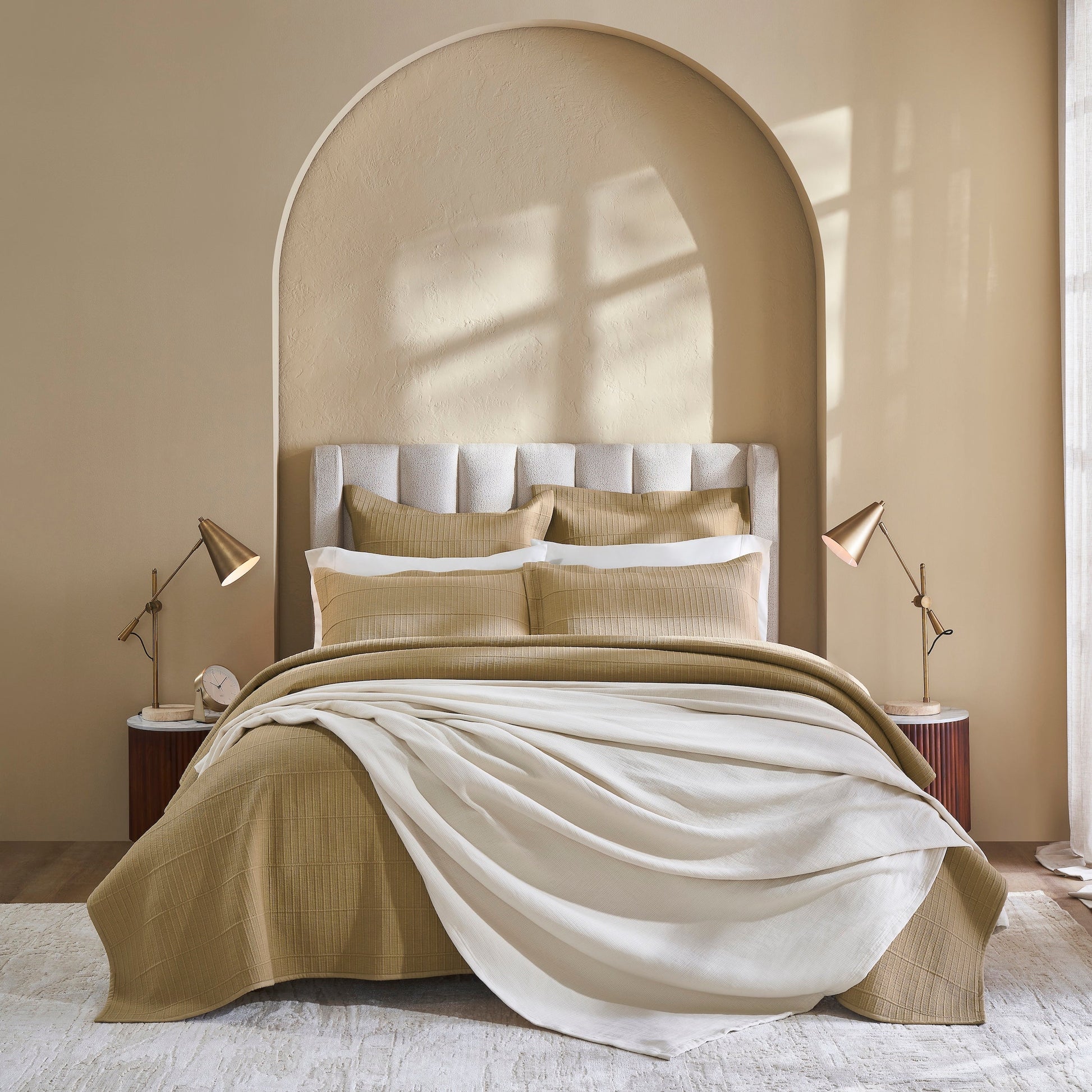 BL-860-11096_1|Cozy gold textured blanket and a soft cream blanket elegantly draped over a bed, adding warmth and style to the room.