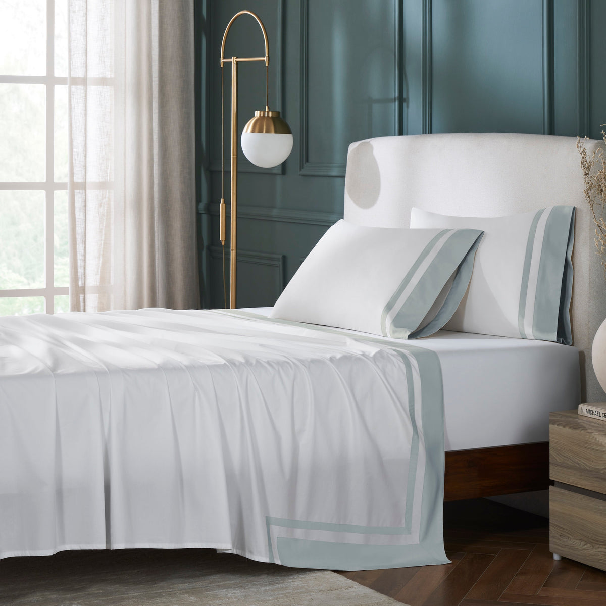 TFL-541-3980_1|Luxurious 100% cotton sheets with elegant light blue striped borders, creating a serene and inviting bedroom aesthetic and comfort. (120 chars)