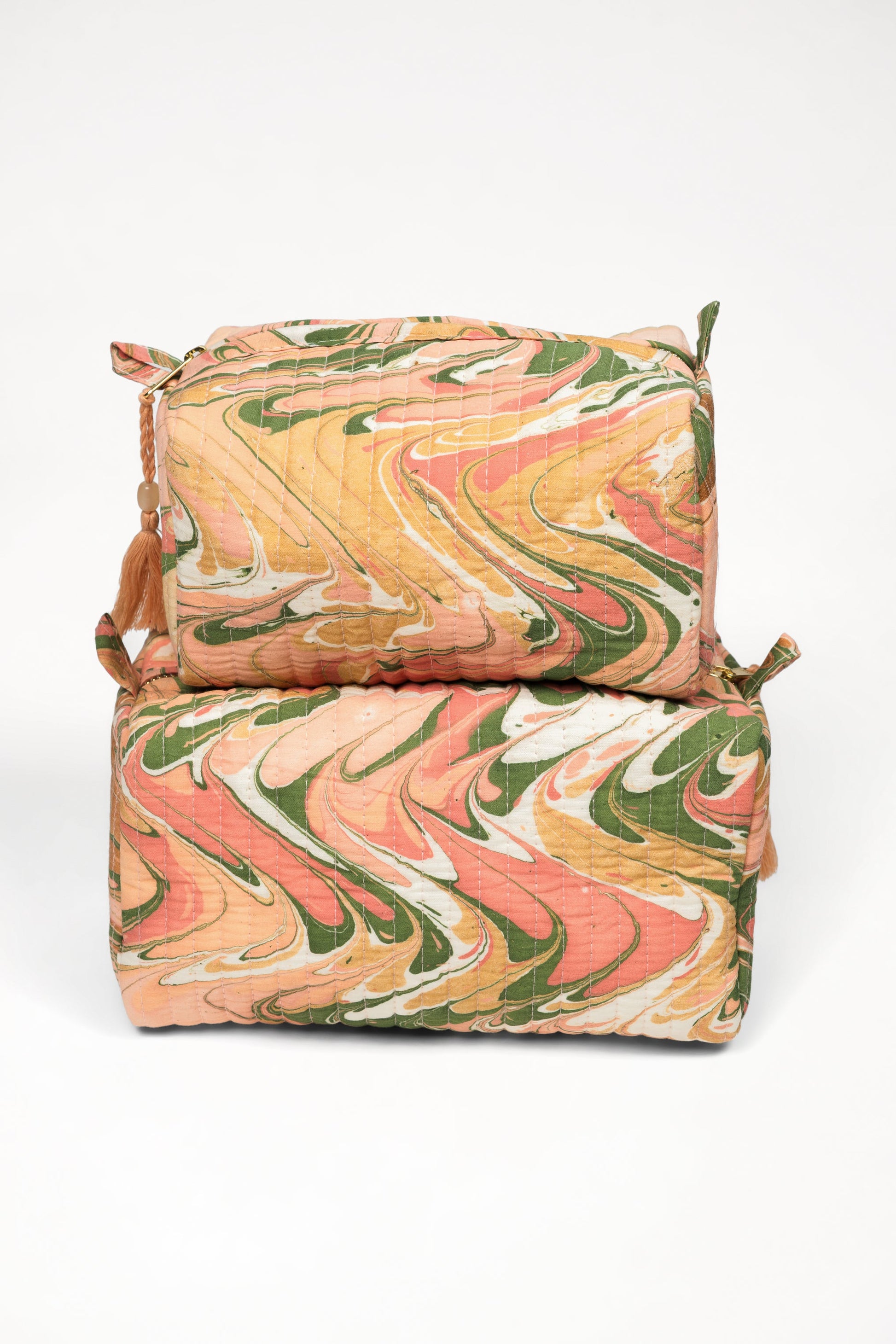 Stacked peony bloom hand-marbled cosmetic bags with zipper closures