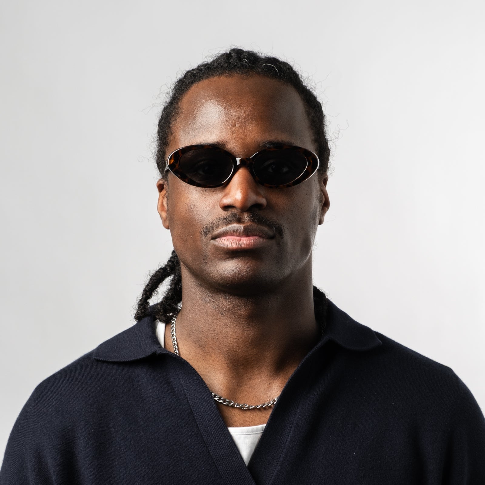Male wearing Sad Eyewear Bloom oval sunglasses in tortoise with UV protection lenses