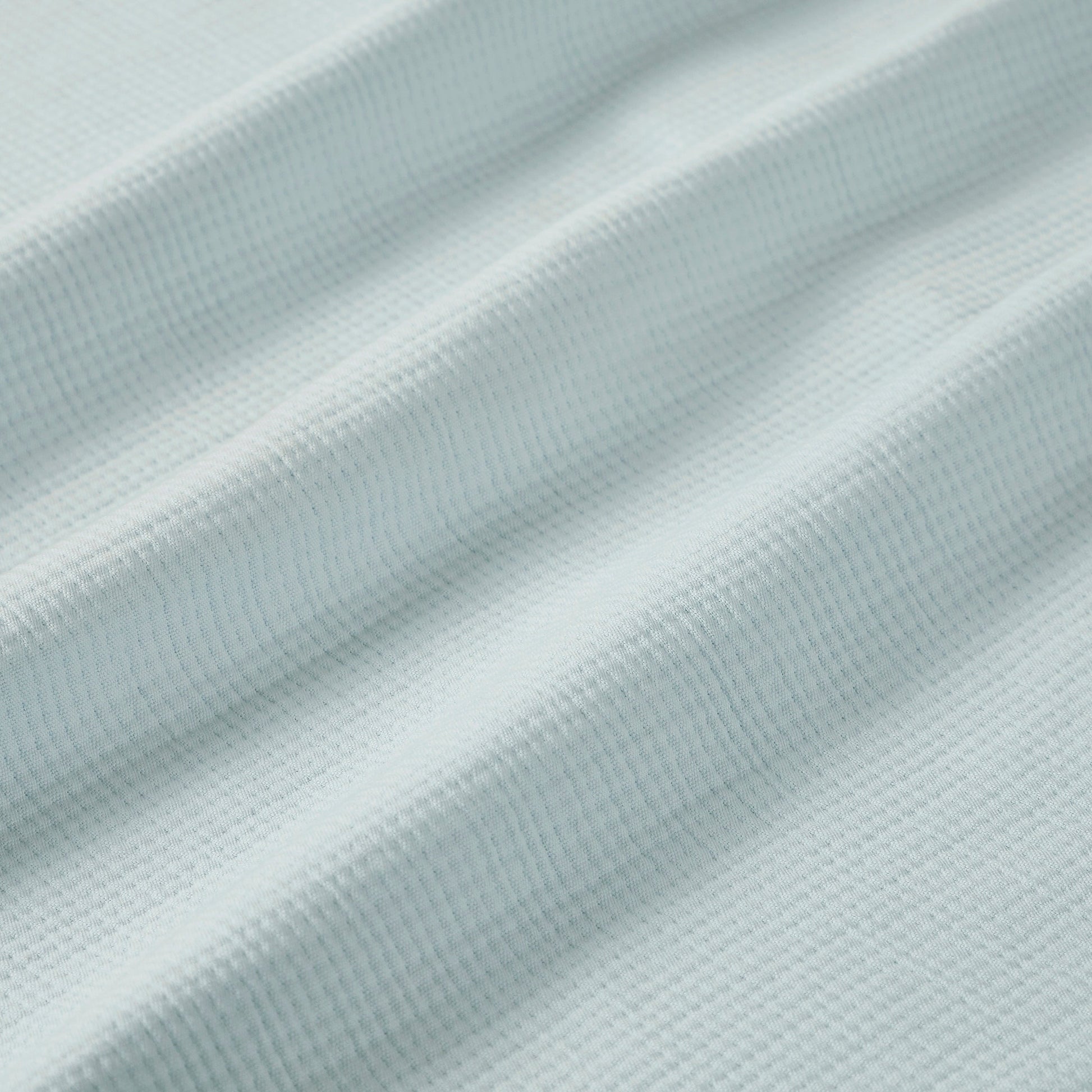 BL-859-11096_9|Close-up of light blue waffle weave blanket texture. Soft, breathable cotton blanket for cozy layering, providing comfort and simple elegance.
