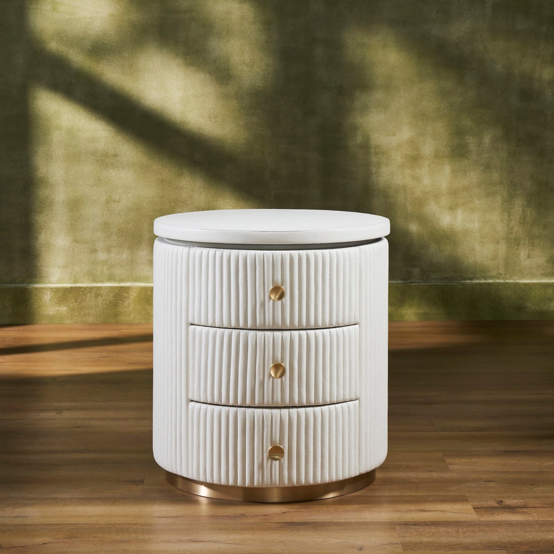 FN-5212-202022_1|Elegant white fluted leather round nightstand with three brass pull drawers, perfect luxury leather bedroom furniture.