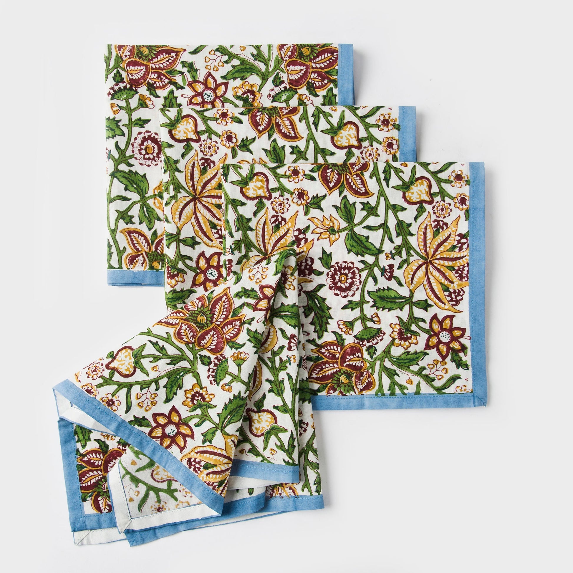 Folded set of 4 Florin blue floral hand block printed cotton napkins.