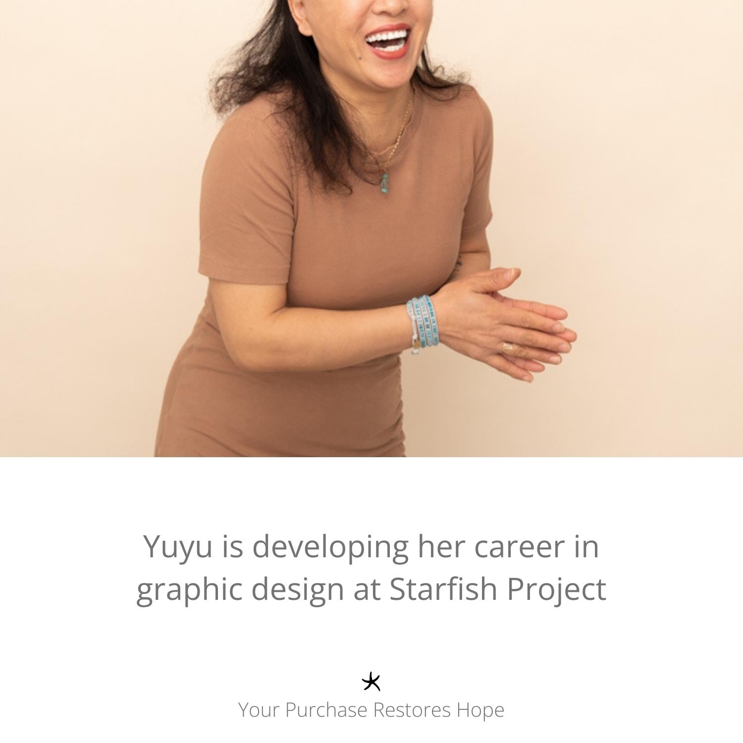 Photo of woman clapping and wearing high quality jewelry, bracelets, women's artisan jewelry, jewelry company, freedom organization