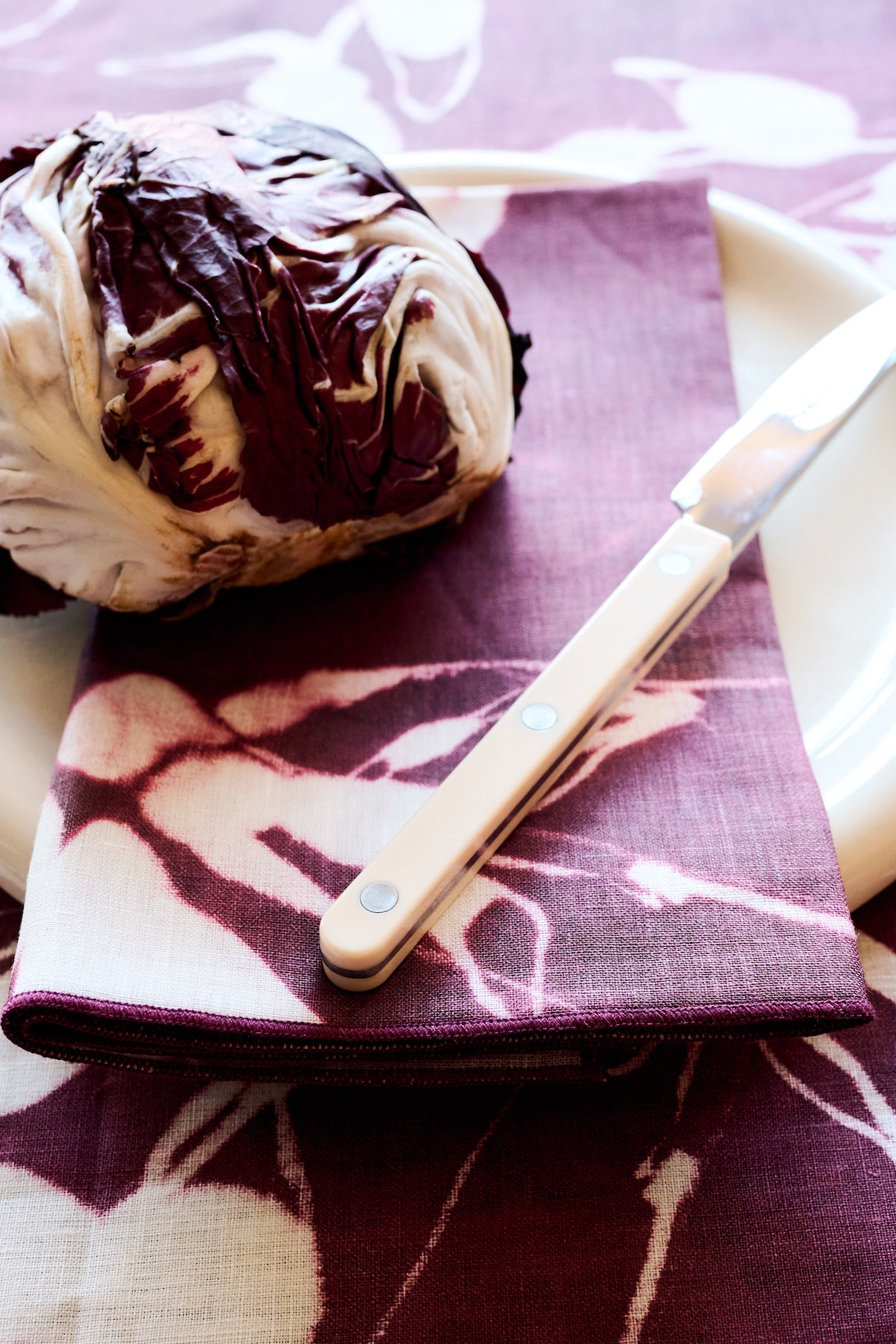 Porto Print Aubergine linen dinner napkin close up of rich aubergine color and linen texture - Goldie Home