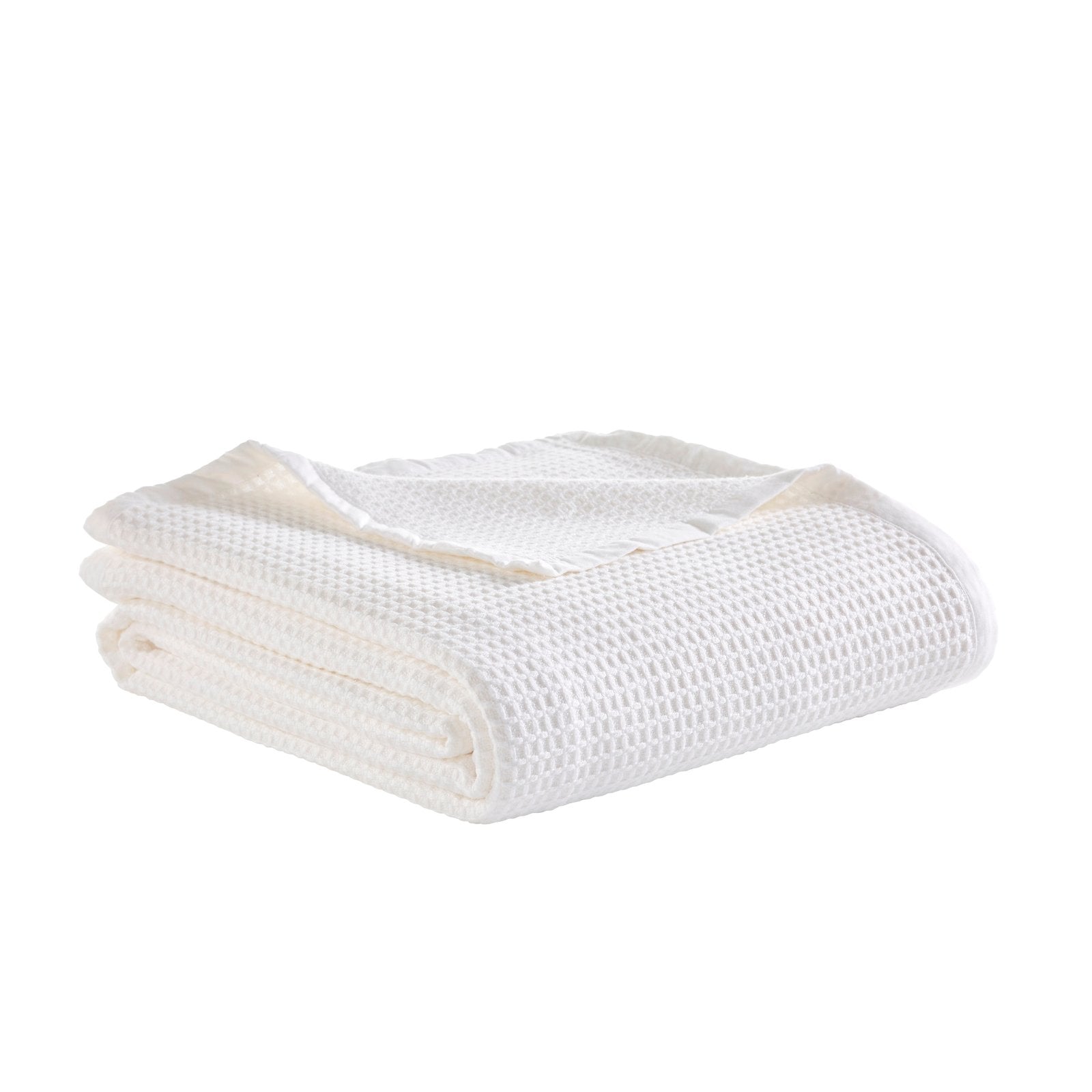 BL-856-9496_3|Perfectly folded white waffle weave blanket, ideal for adding a touch of classic comfort and texture to any room.