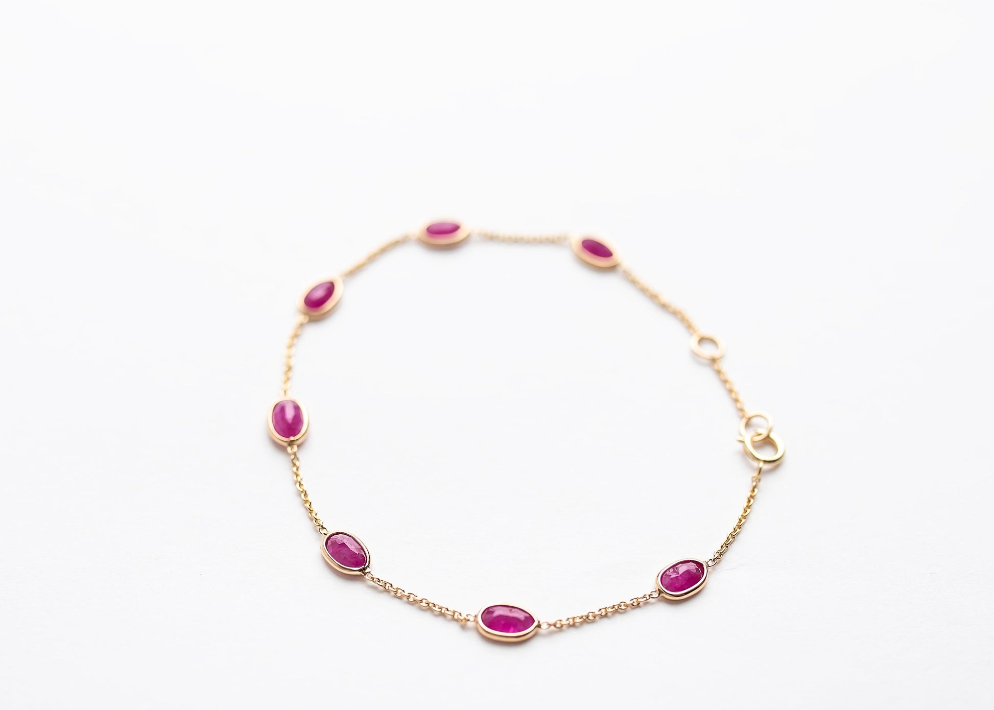 Ruby Radiance minimal everyday fine jewelry in solid gold and sterling 925 silver with natural gemstones.