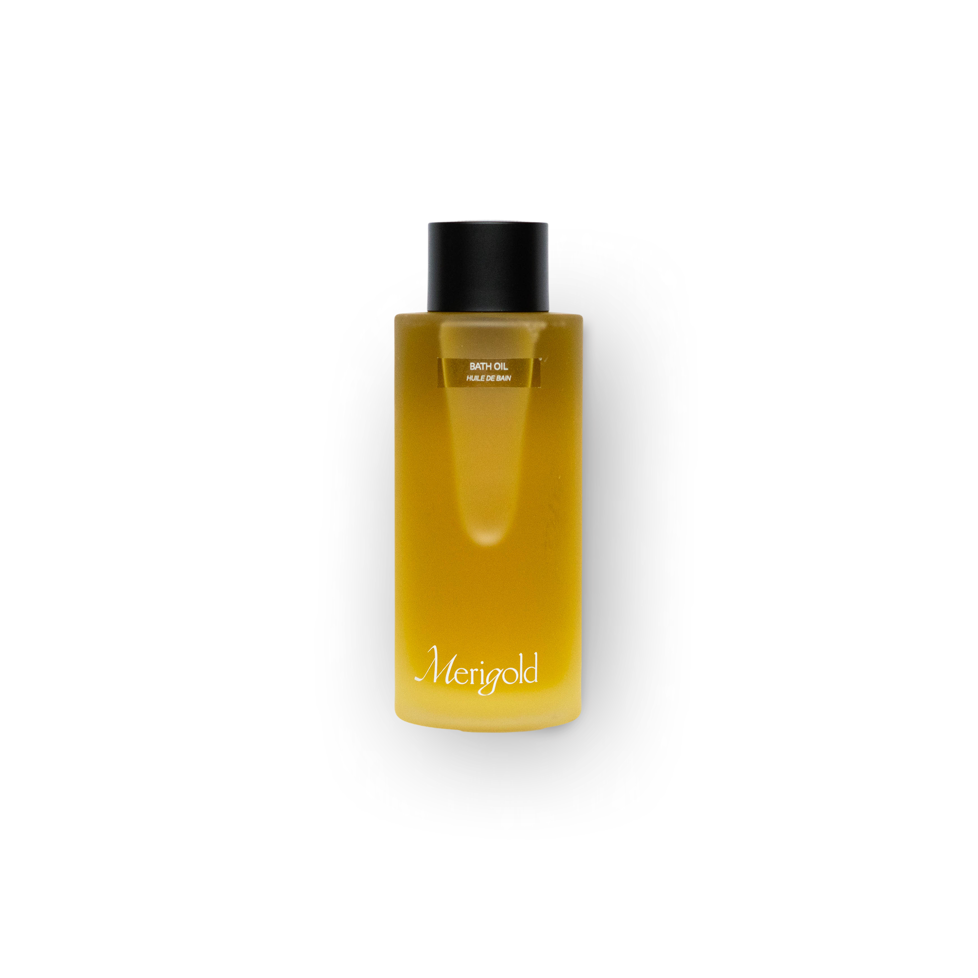 Merigold Bath Oil in frosted clear glass bottle with black cap – nourishing, moisturizing body treatment for dry or sensitive skin, used for self-care and ritual bathing.