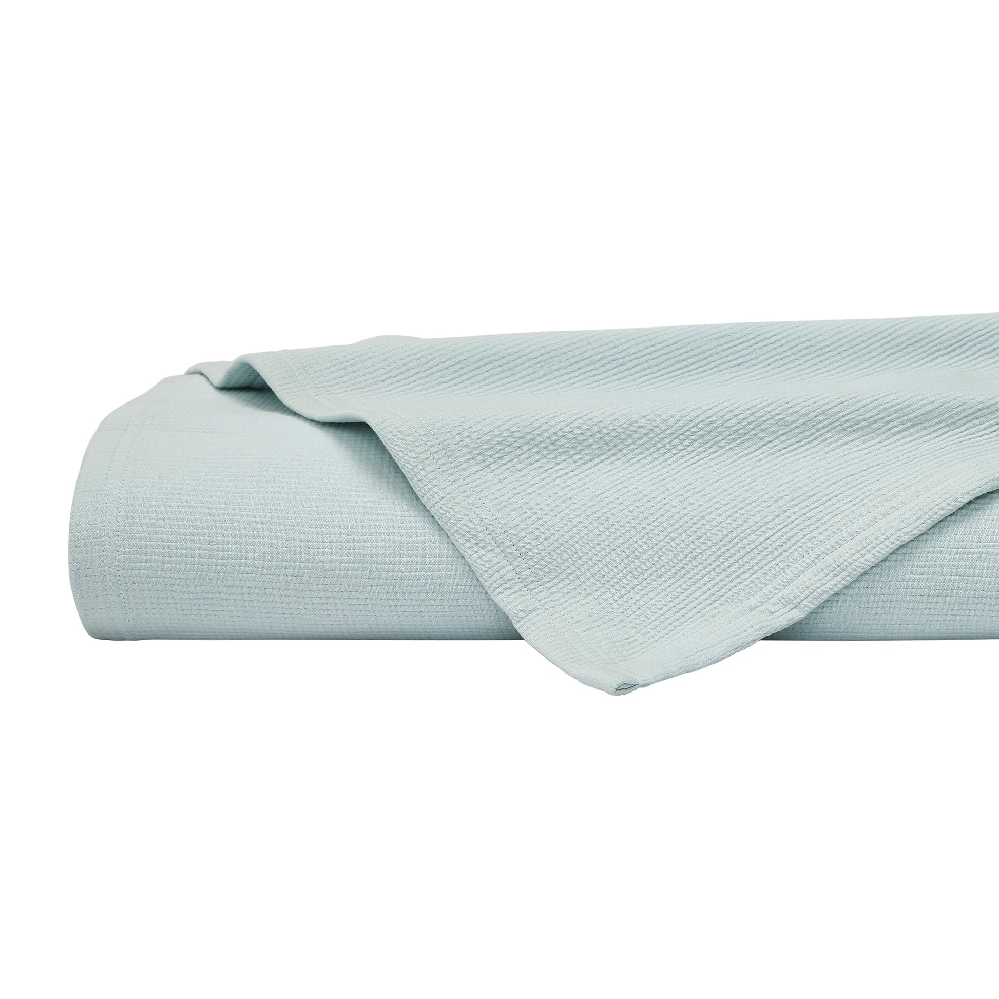 BL-859-9496_8|Close-up of a folded light blue waffle weave blanket, showcasing its texture. Ideal for bedroom decor or a cozy throw.
