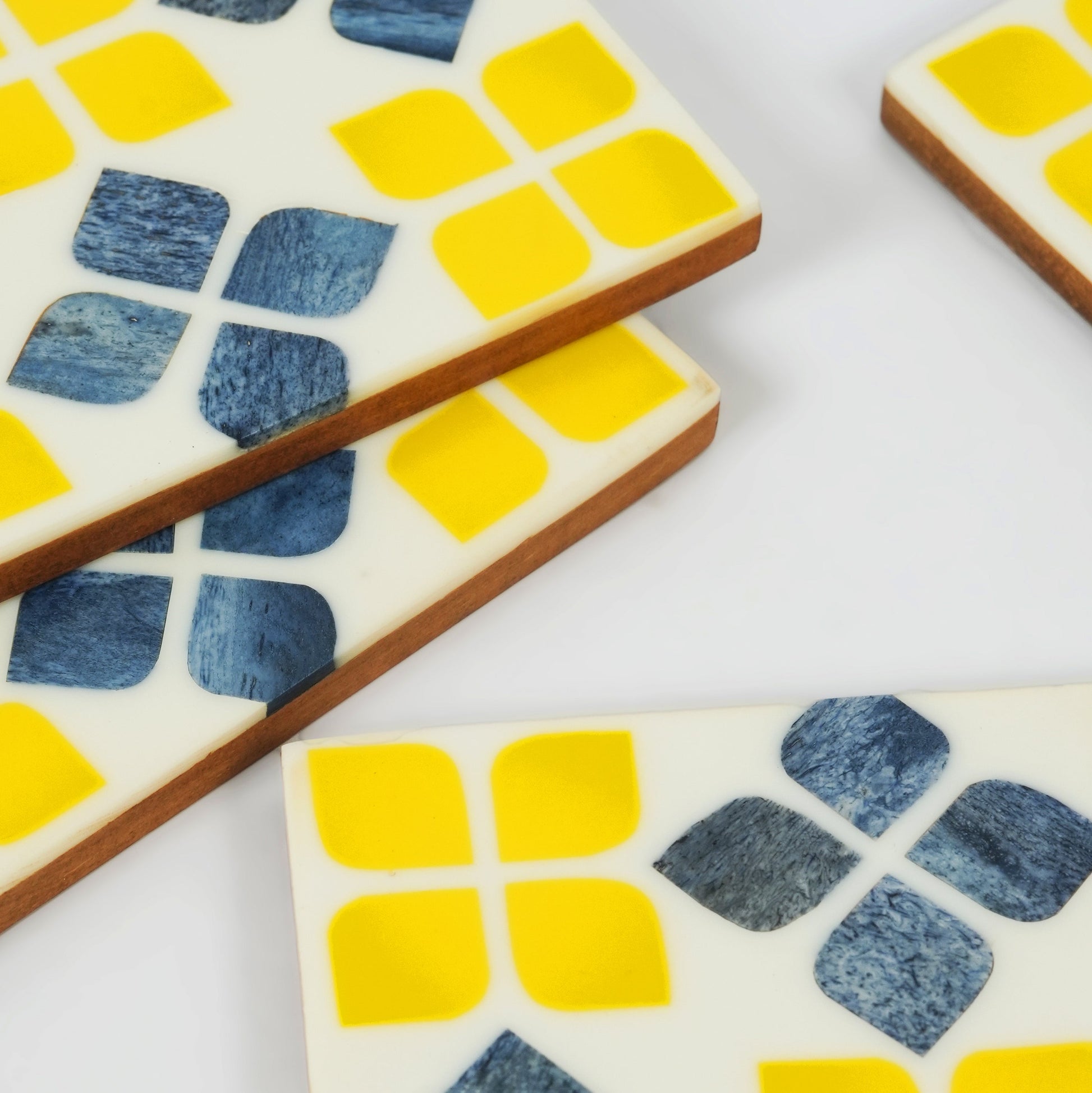 close-up handcrafted bone inlay marigold mosaic pattern coaster