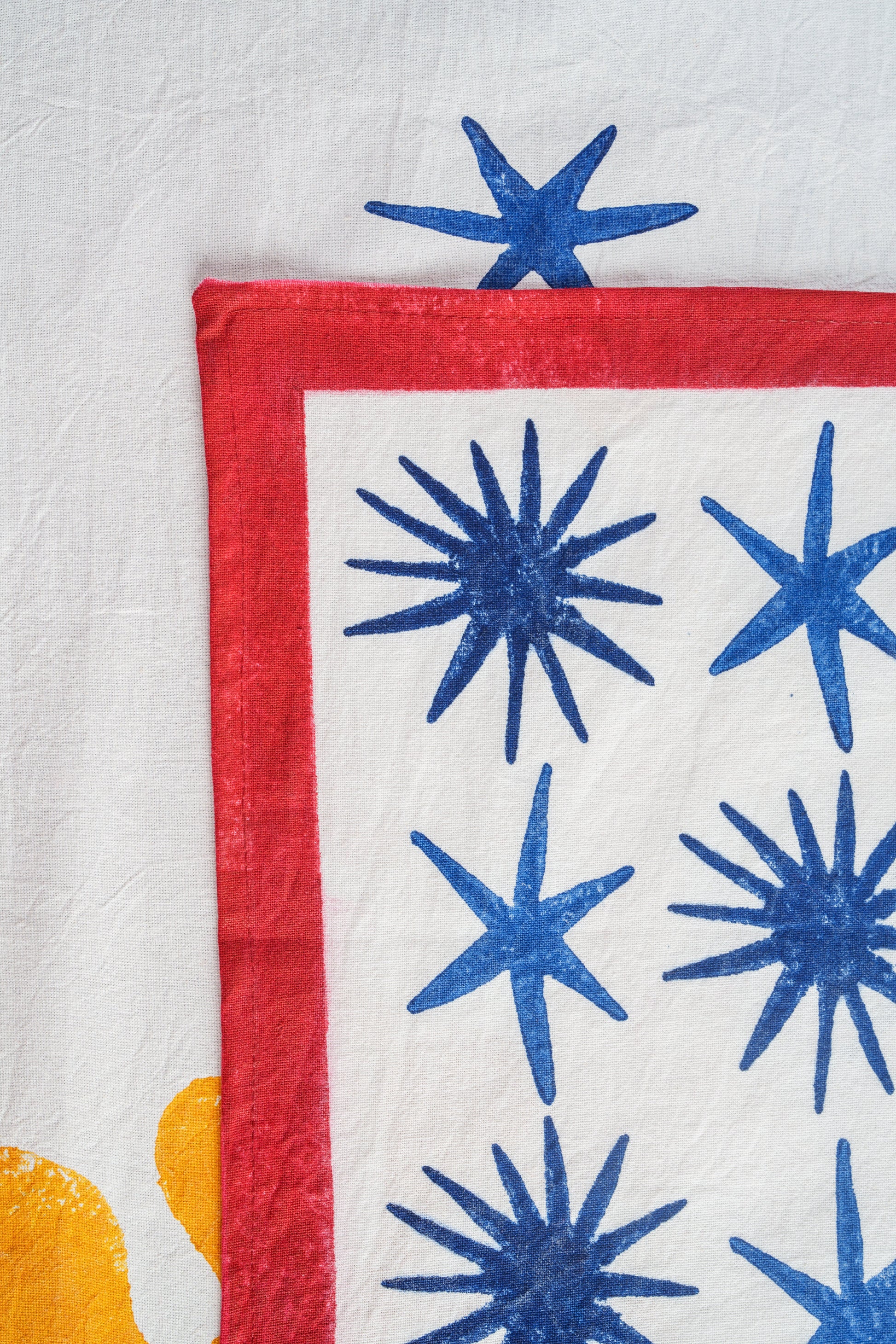 Inner Child Celestial Matisse blockprint placemat close-up showing blue star patterns