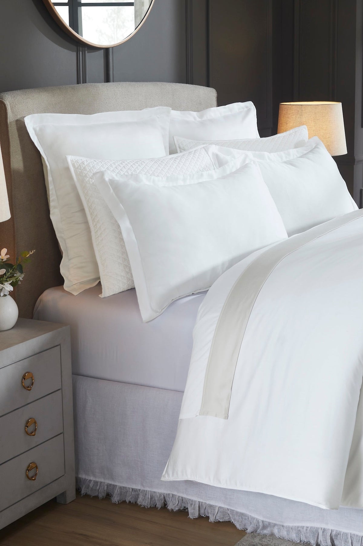 DT-045-10692_3|Close-up of crisp white duvet cover and matching elegant shams, adding a clean, modern aesthetic to any bedroom decor.