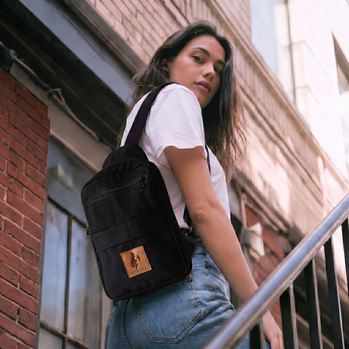 Umoja black canvas crossbody sling bag for men and women #color_black